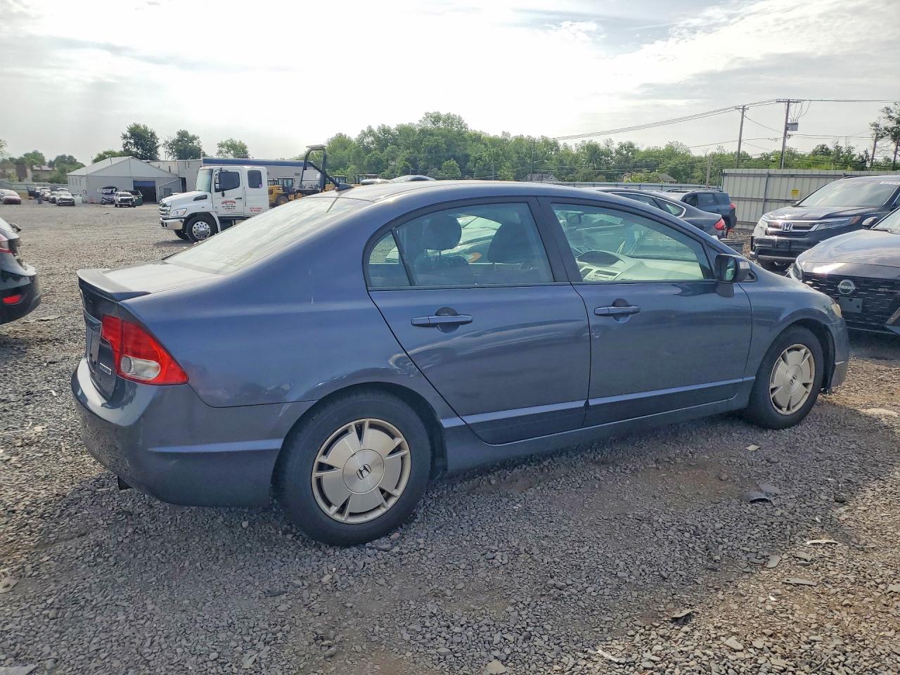 2010 Honda Civic Hybrid Blue vin: JHMFA3F25AS004714