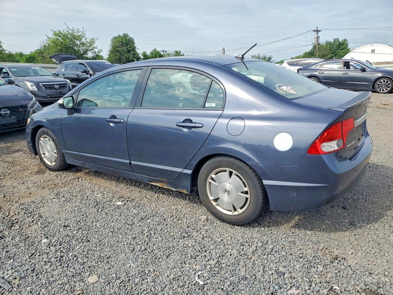 2010 Honda Civic Hybrid Blue vin: JHMFA3F25AS004714