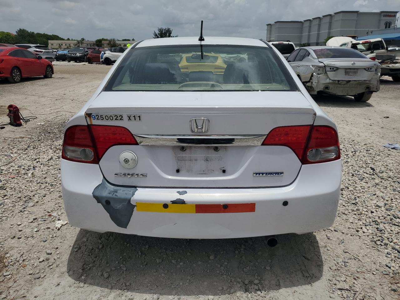 2011 Honda Civic Hybrid White vin: JHMFA3F25BS000129 Damage: Deck Lid, Rust, 4 To 5 Inches