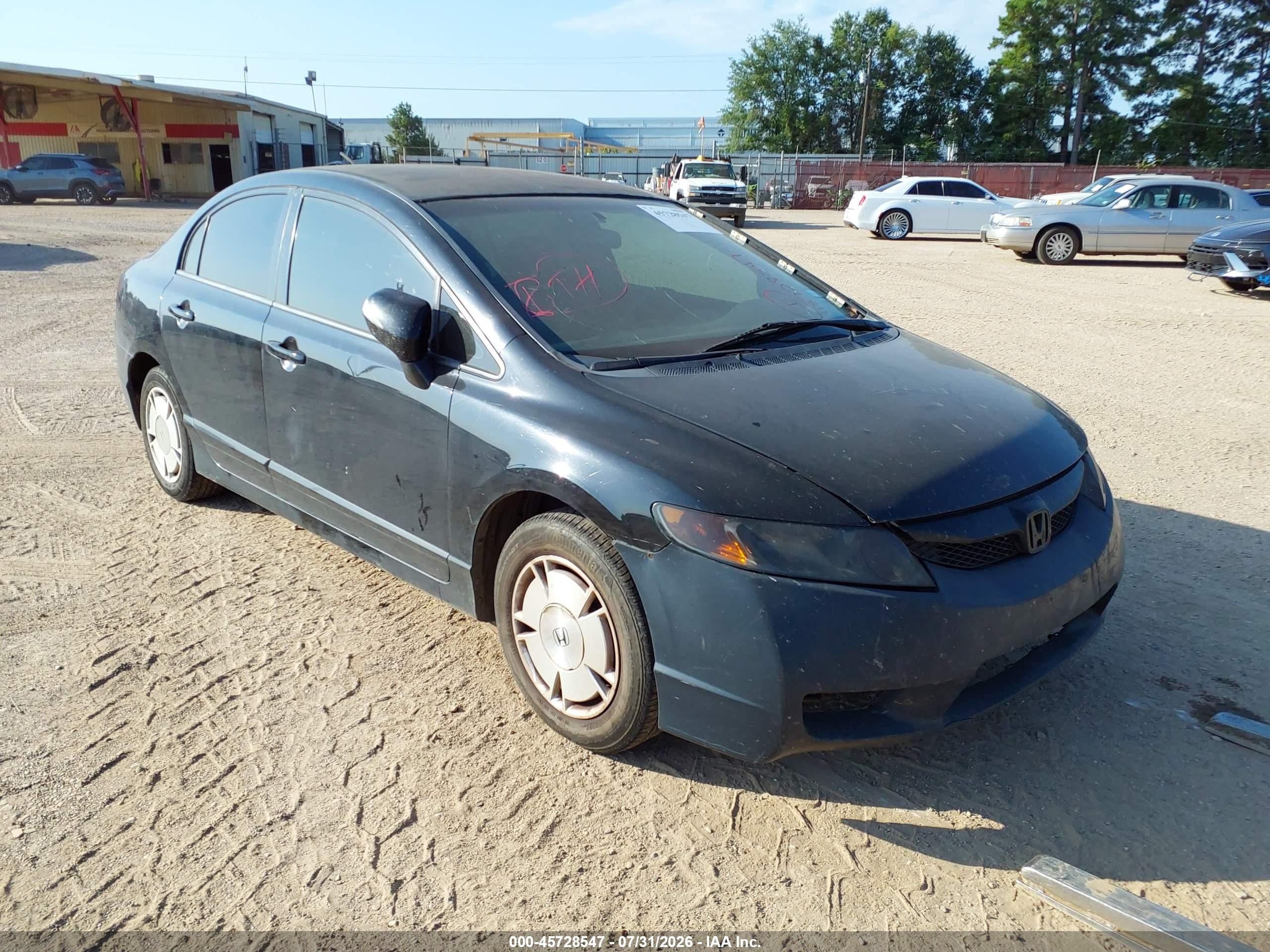 2010 Honda Civic Hybrid   Black vin: JHMFA3F26AS007315