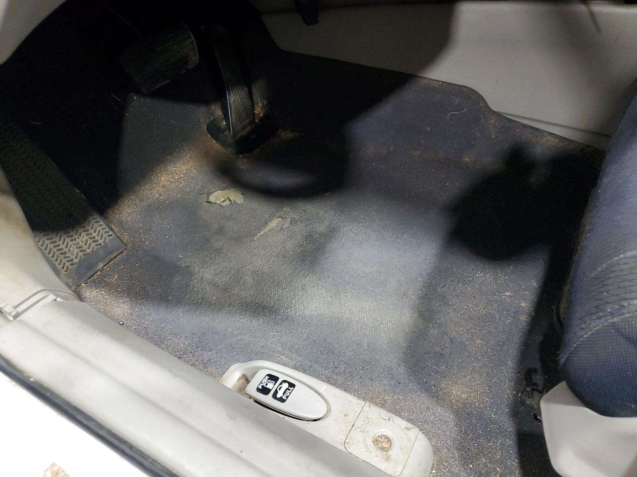 2011 Honda Civic Hybrid White vin: JHMFA3F26BS000110 Damage: Left Front Carpet, Torn, 4 To 5 Inches
