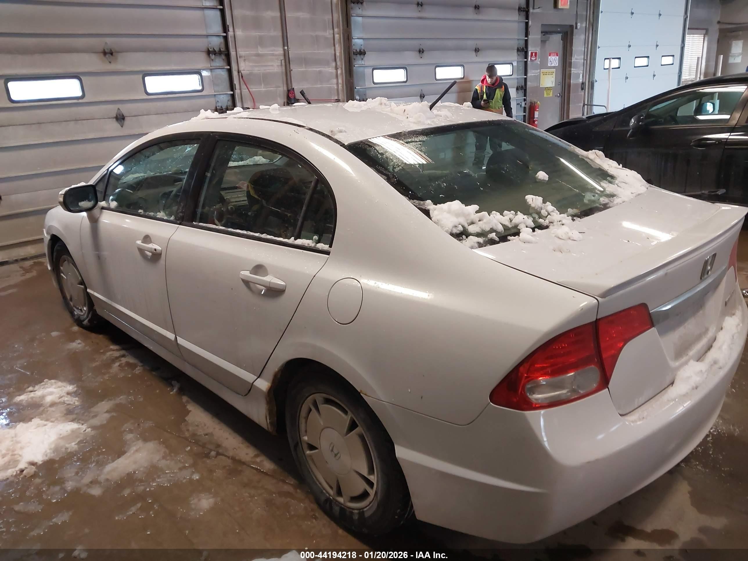 2011 Honda Civic Hybrid   White vin: JHMFA3F27BS000049