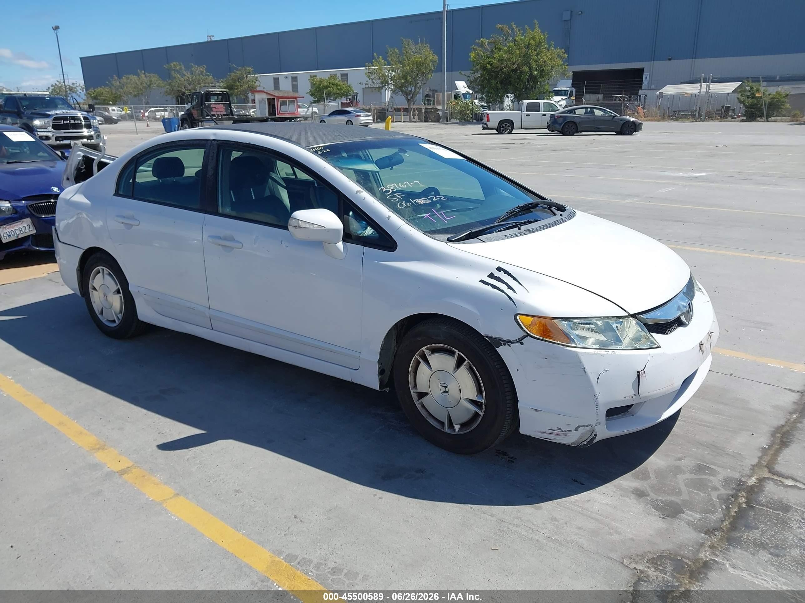 2010 Honda Civic Hybrid   White vin: JHMFA3F28AS007560