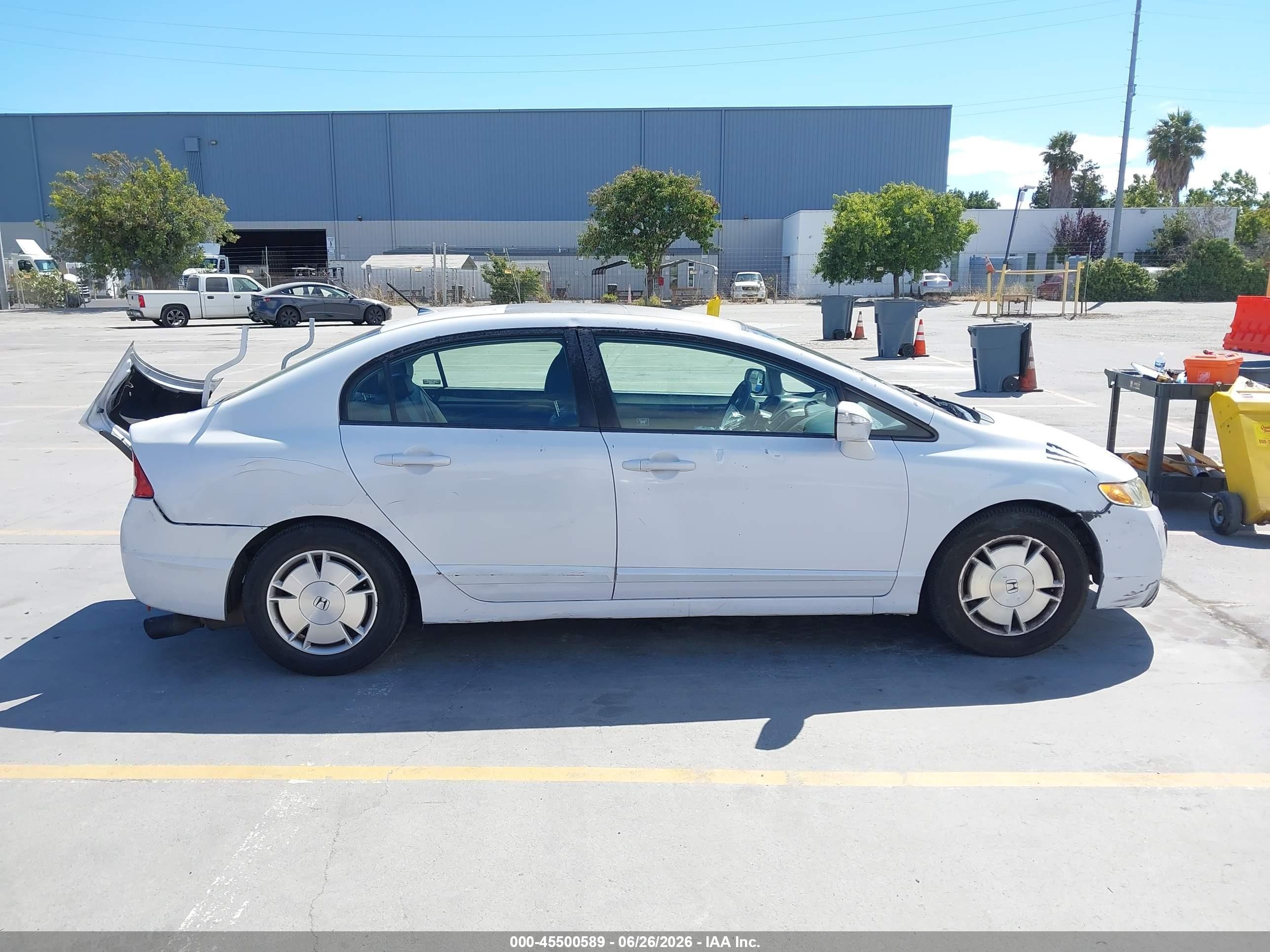 2010 Honda Civic Hybrid   White vin: JHMFA3F28AS007560