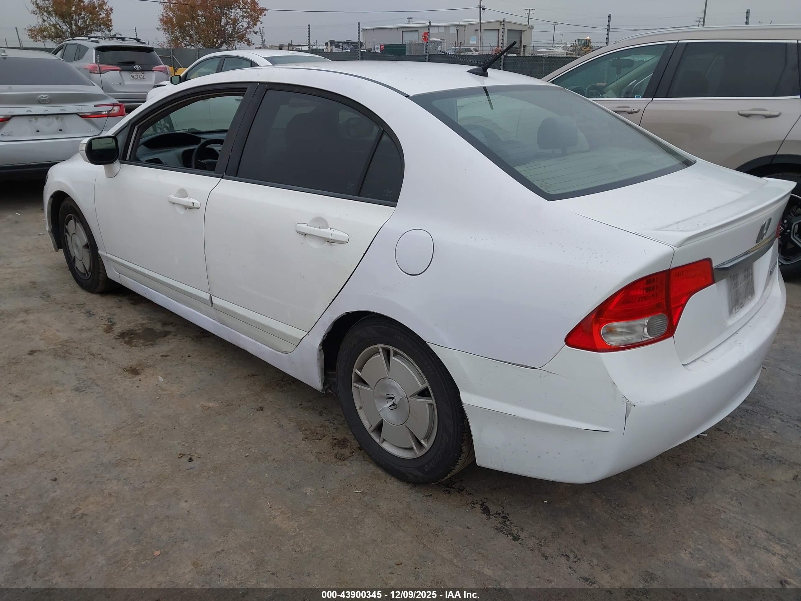 2011 Honda Civic Hybrid   White vin: JHMFA3F28BS000111