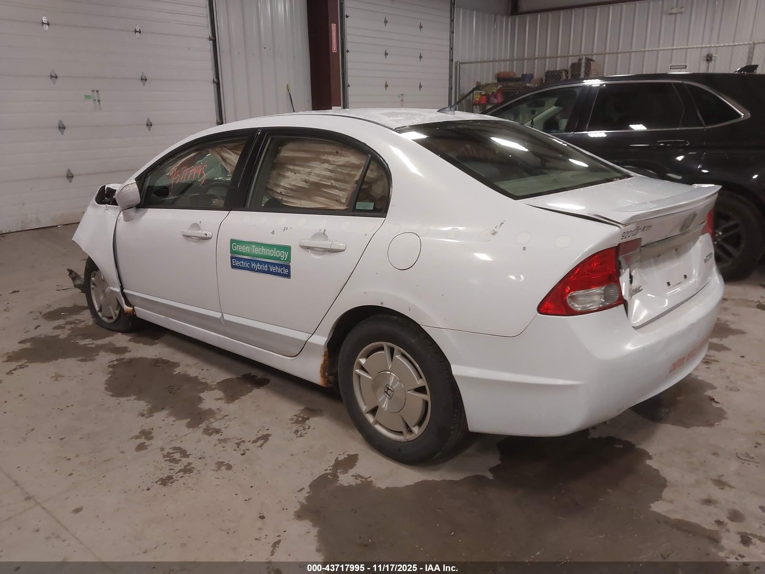 2011 Honda Civic Hybrid   White vin: JHMFA3F28BS000383