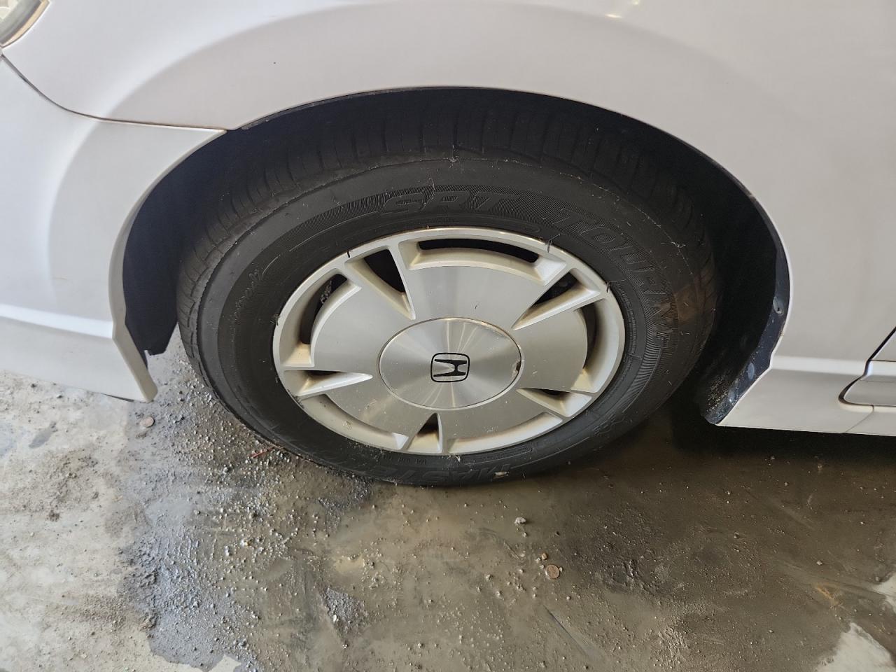 2011 Honda Civic Hybrid White vin: JHMFA3F29BS000134 Damage: Left Front Wheel, Curb Rash, 3 To 4 Inches