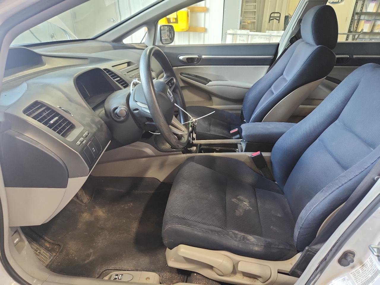 2011 Honda Civic Hybrid White vin: JHMFA3F29BS000134 Damage: Steering Wheel, Worn, Replacement Required