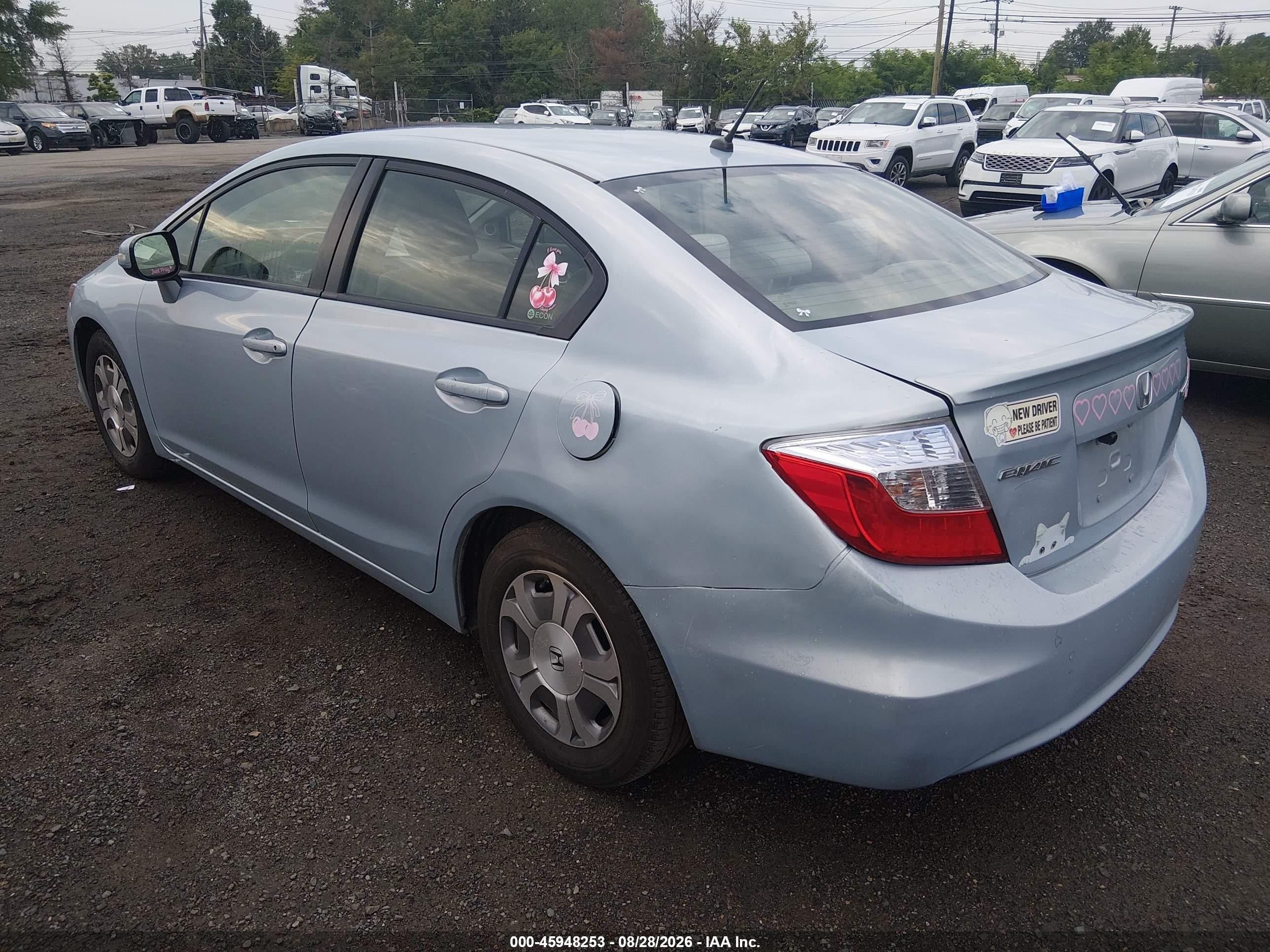 2012 Honda Civic Hybrid   Light Blue vin: JHMFB4F20CS008837
