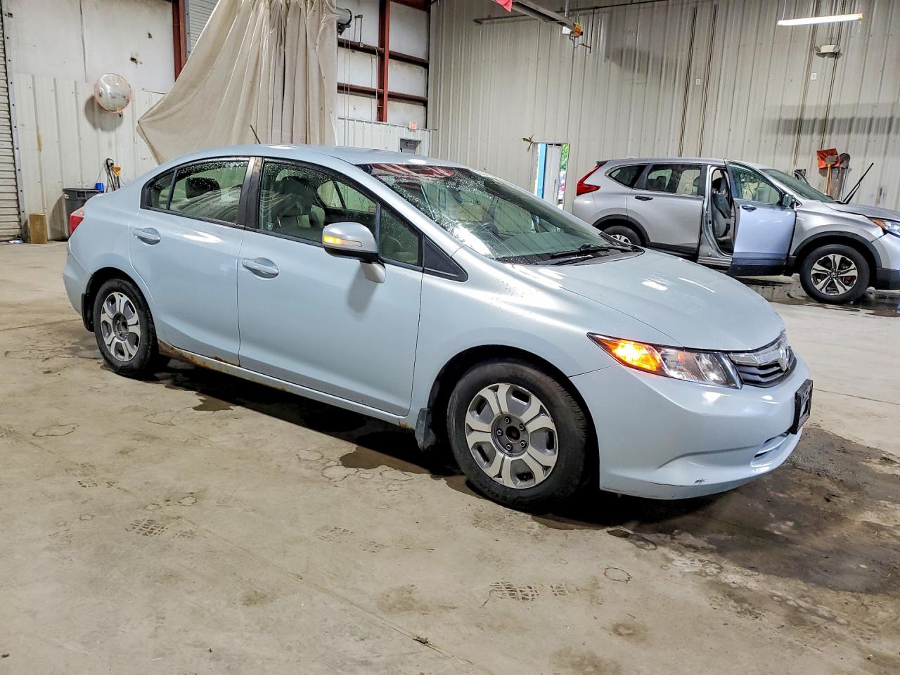 2012 Honda Civic Hybrid Blue vin: JHMFB4F24CS009635