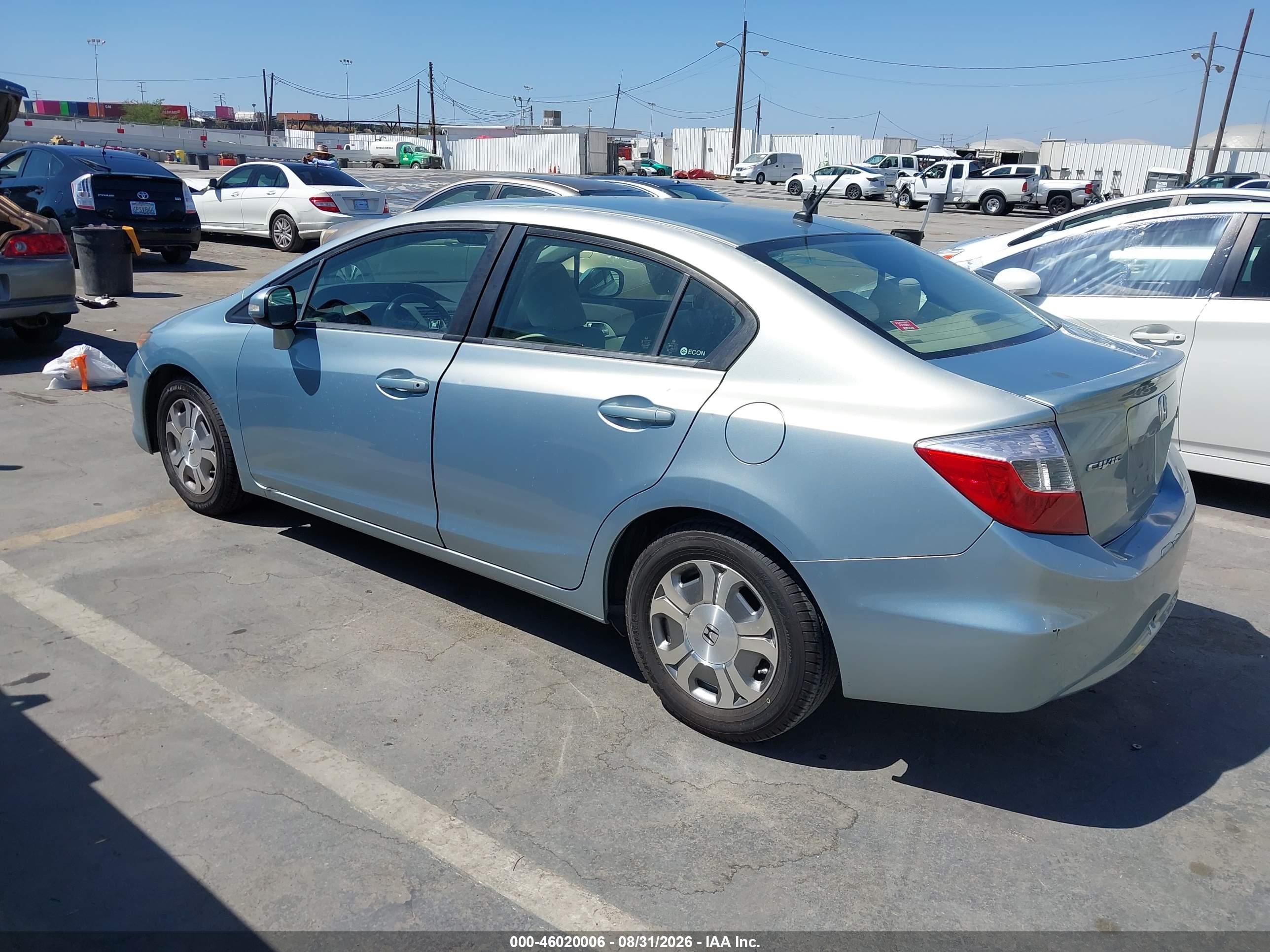 2012 Honda Civic Hybrid   Light Blue vin: JHMFB4F25CS007716