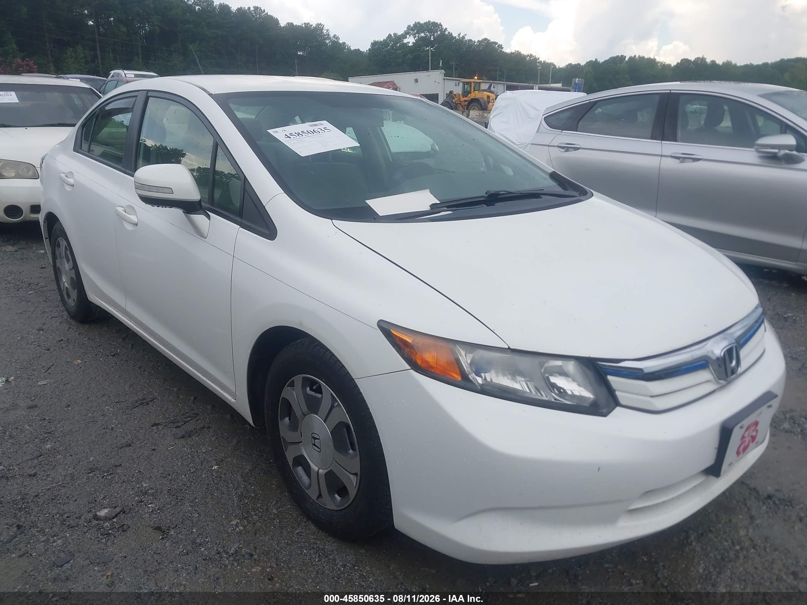 2012 Honda Civic Hybrid   White vin: JHMFB4F27CS006504