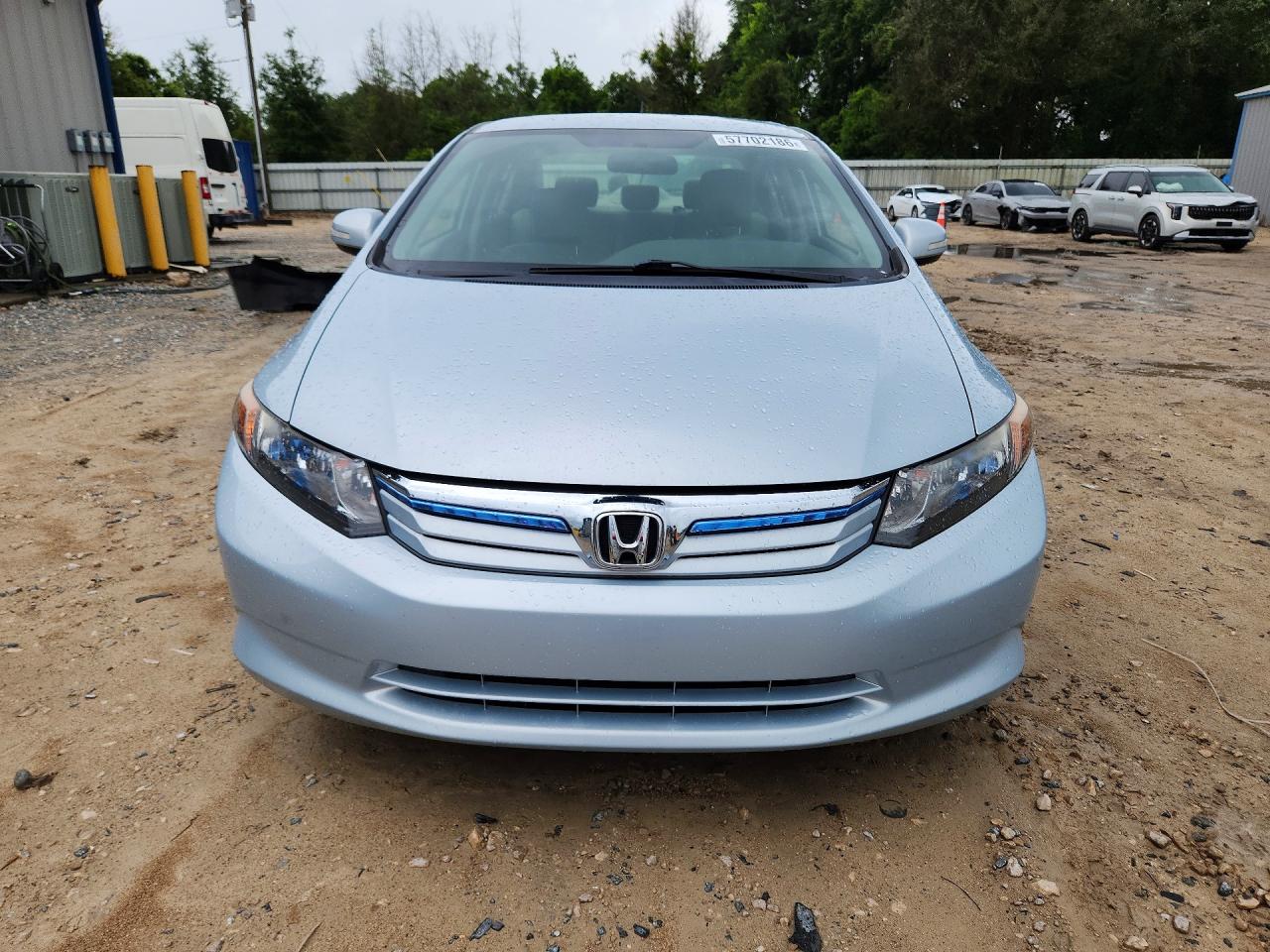 2012 Honda Civic Blue vin: JHMFB4F27CS009127