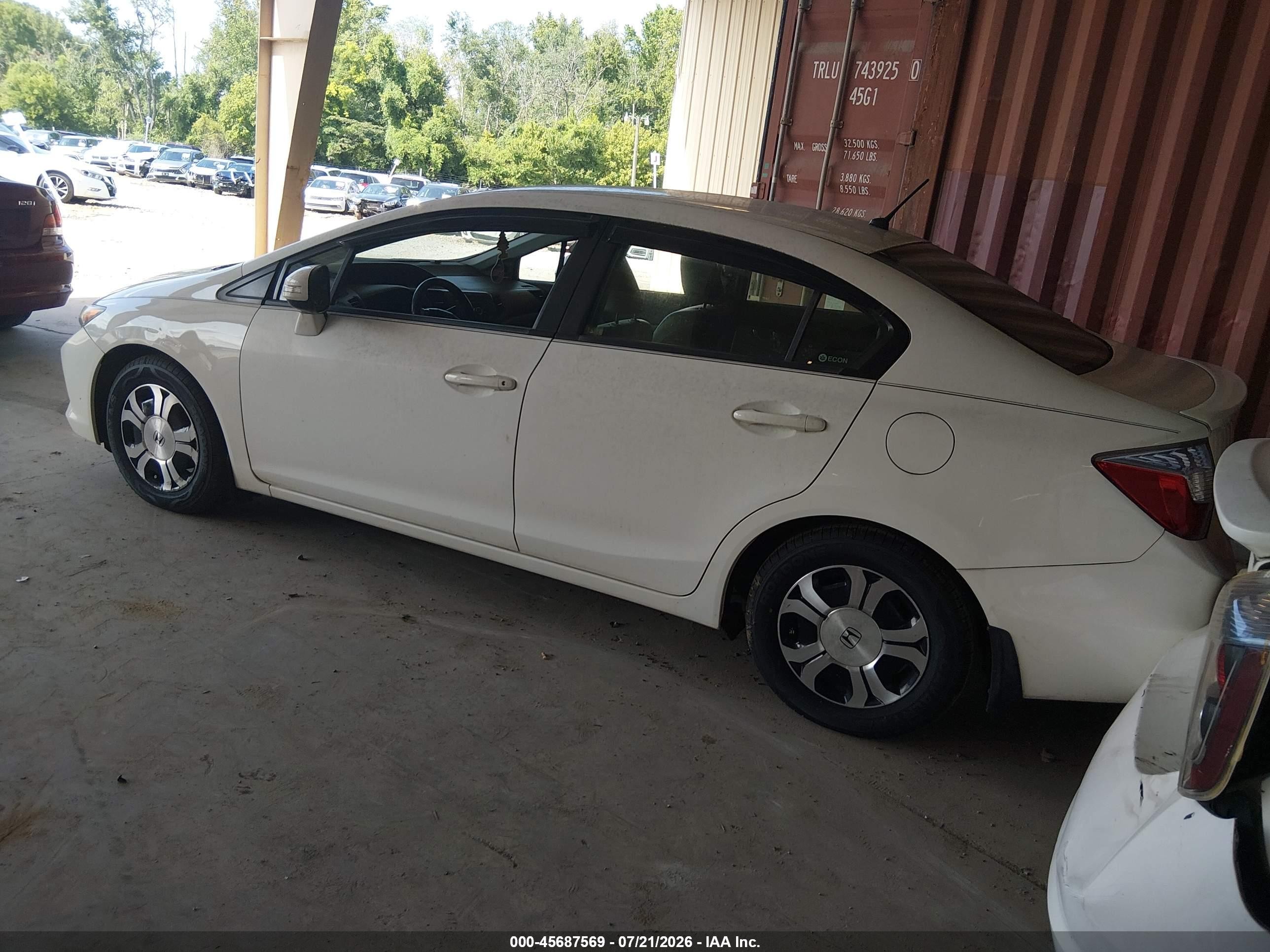 2012 Honda Civic Hybrid   White vin: JHMFB4F34CS007795
