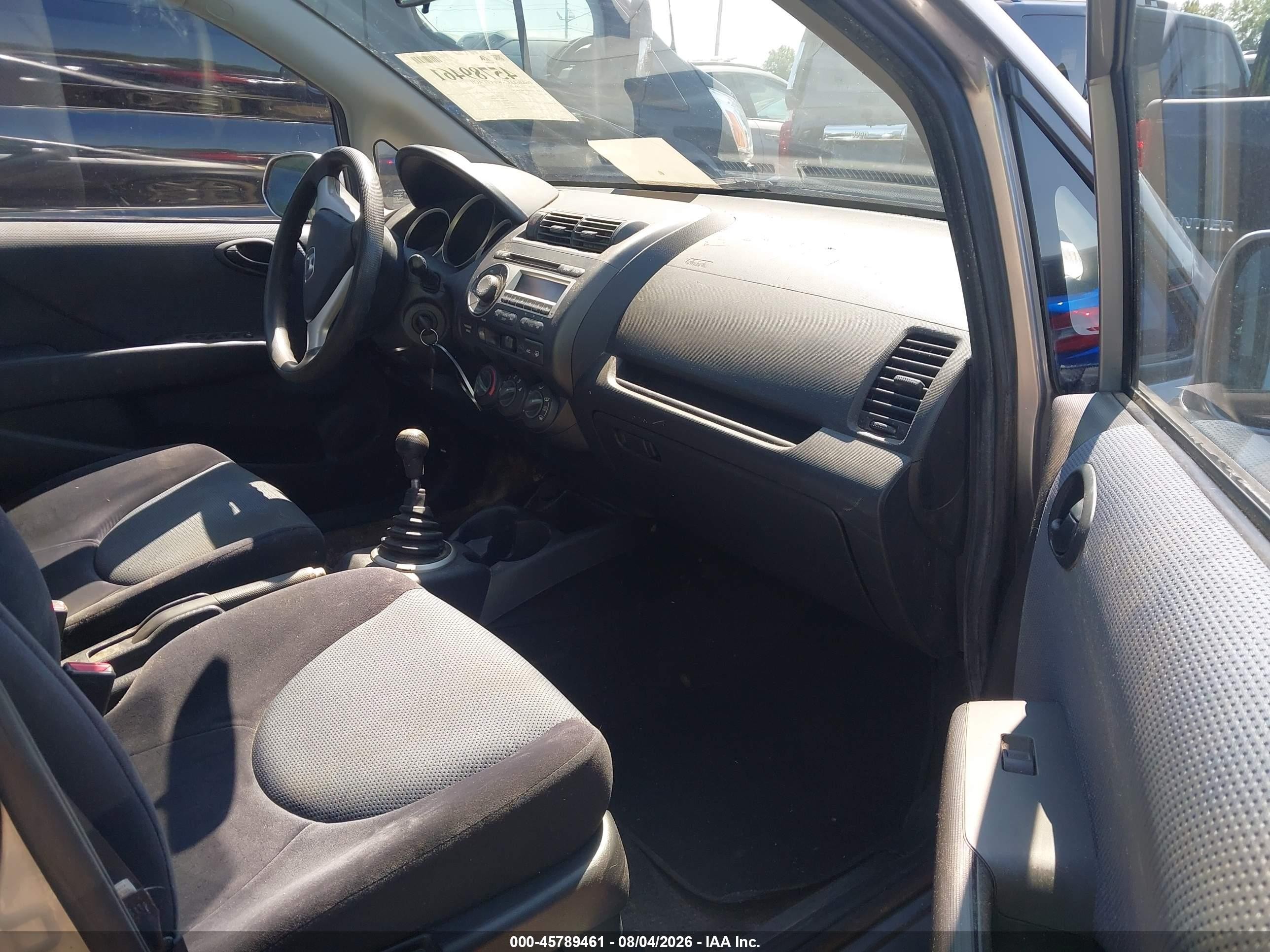 2007 Honda Fit   Gray vin: JHMGD37457S002563