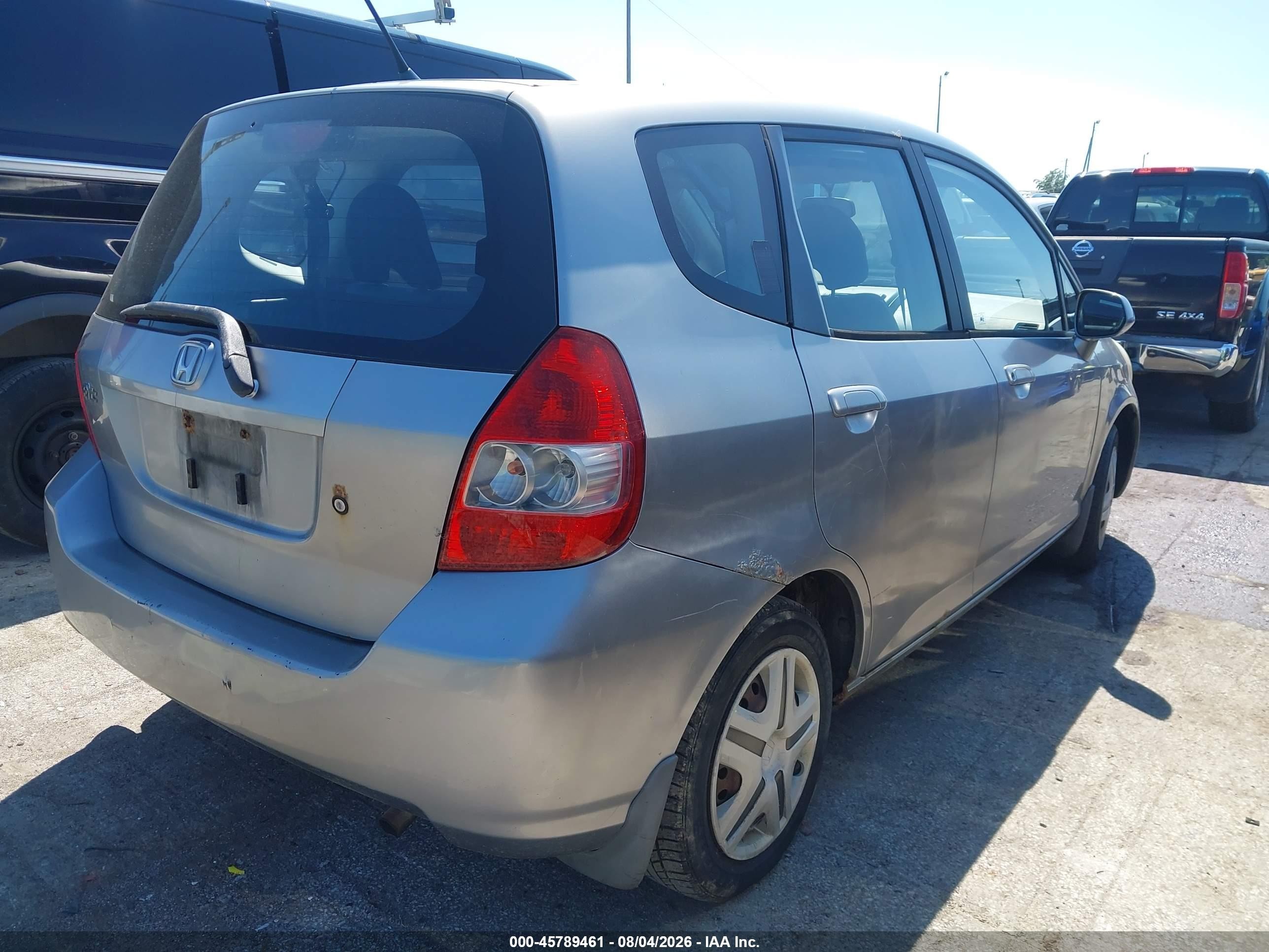 2007 Honda Fit   Gray vin: JHMGD37457S002563