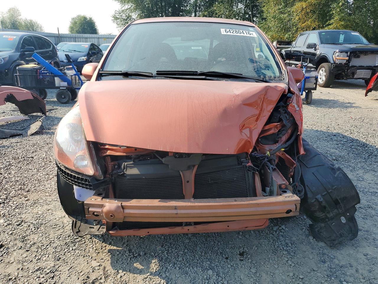 2007 Honda Fit S Orange vin: JHMGD37627S065296