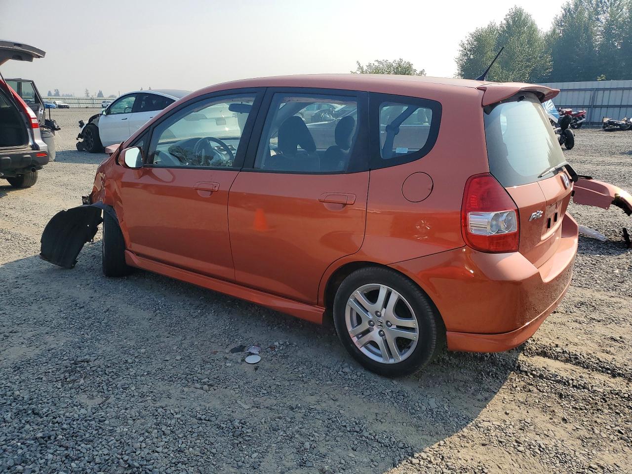 2007 Honda Fit S Orange vin: JHMGD37627S065296