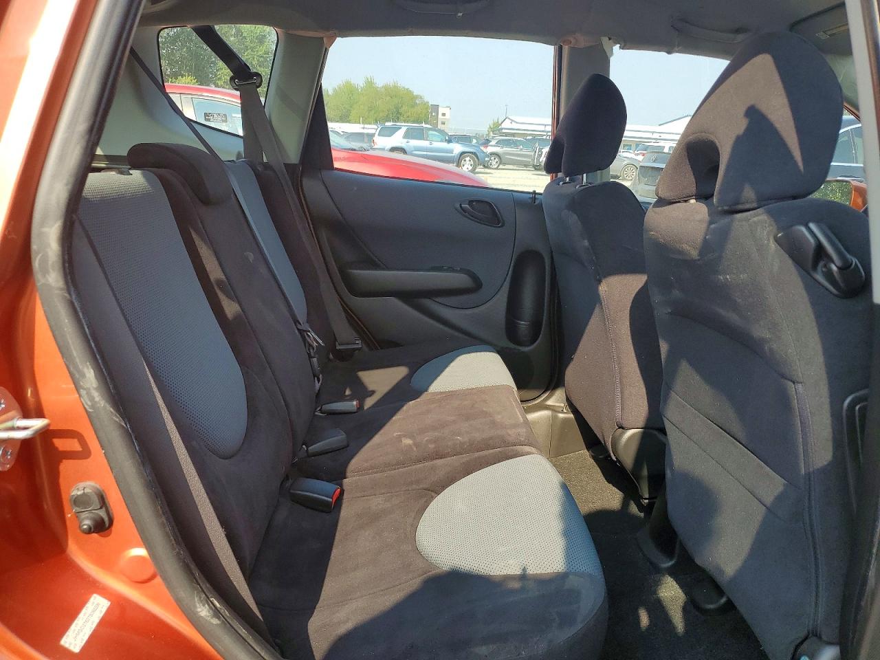 2007 Honda Fit S Orange vin: JHMGD37627S065296