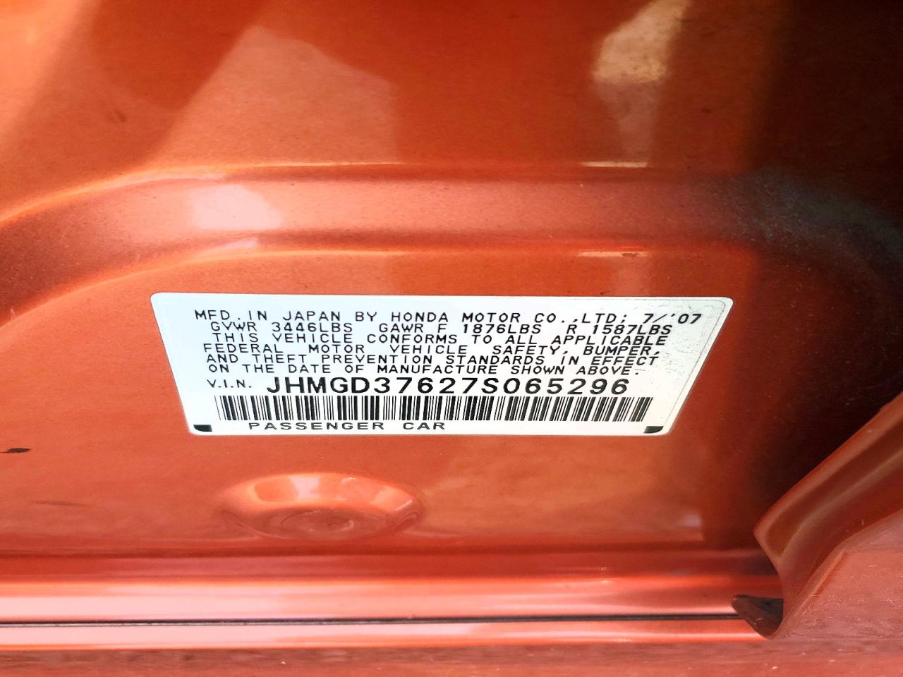 2007 Honda Fit S Orange vin: JHMGD37627S065296