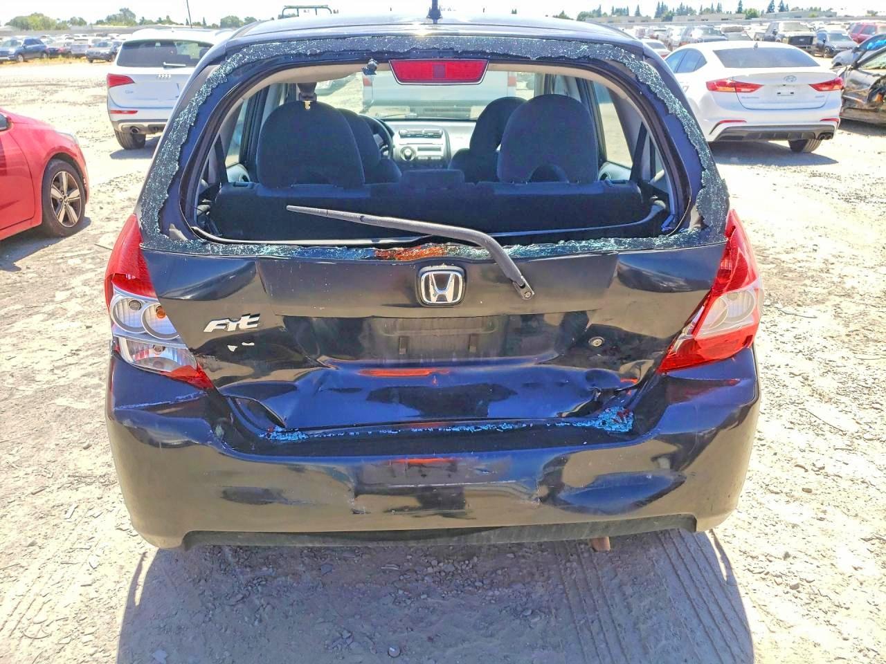 2007 Honda Fit Black vin: JHMGD38407S025019