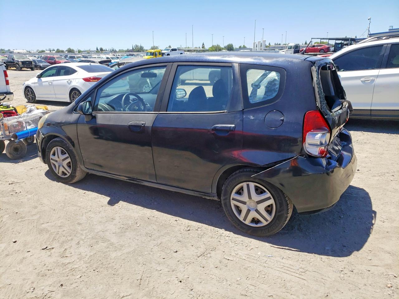 2007 Honda Fit Black vin: JHMGD38407S025019