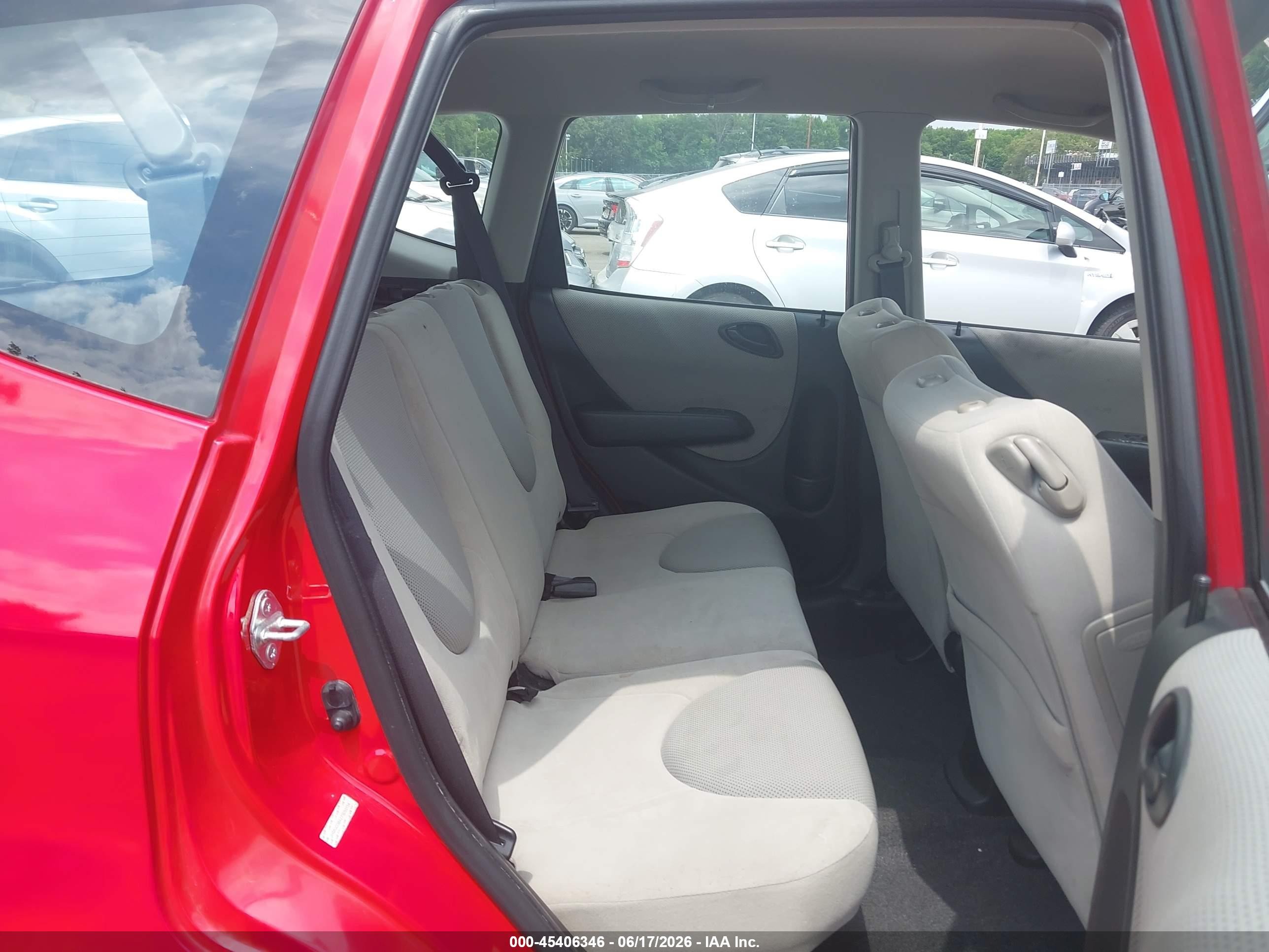 2007 Honda Fit   Red vin: JHMGD38427S055154