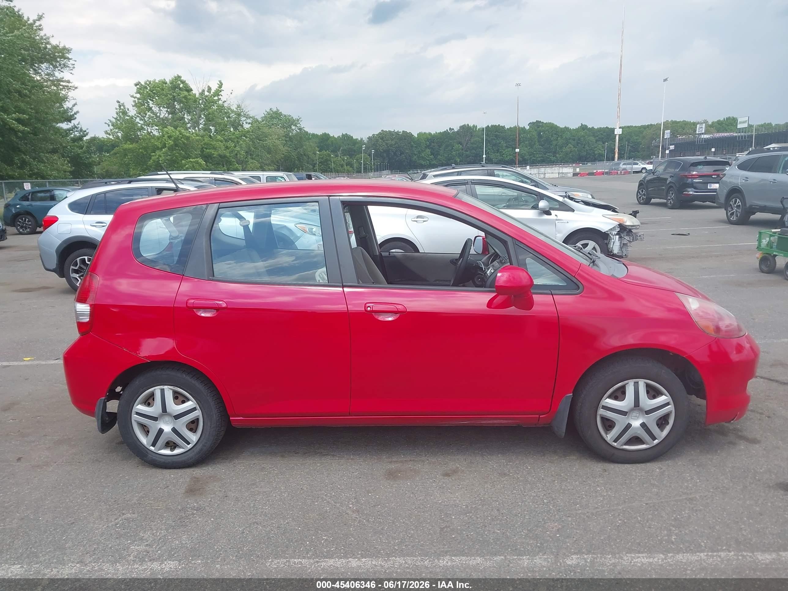 2007 Honda Fit   Red vin: JHMGD38427S055154