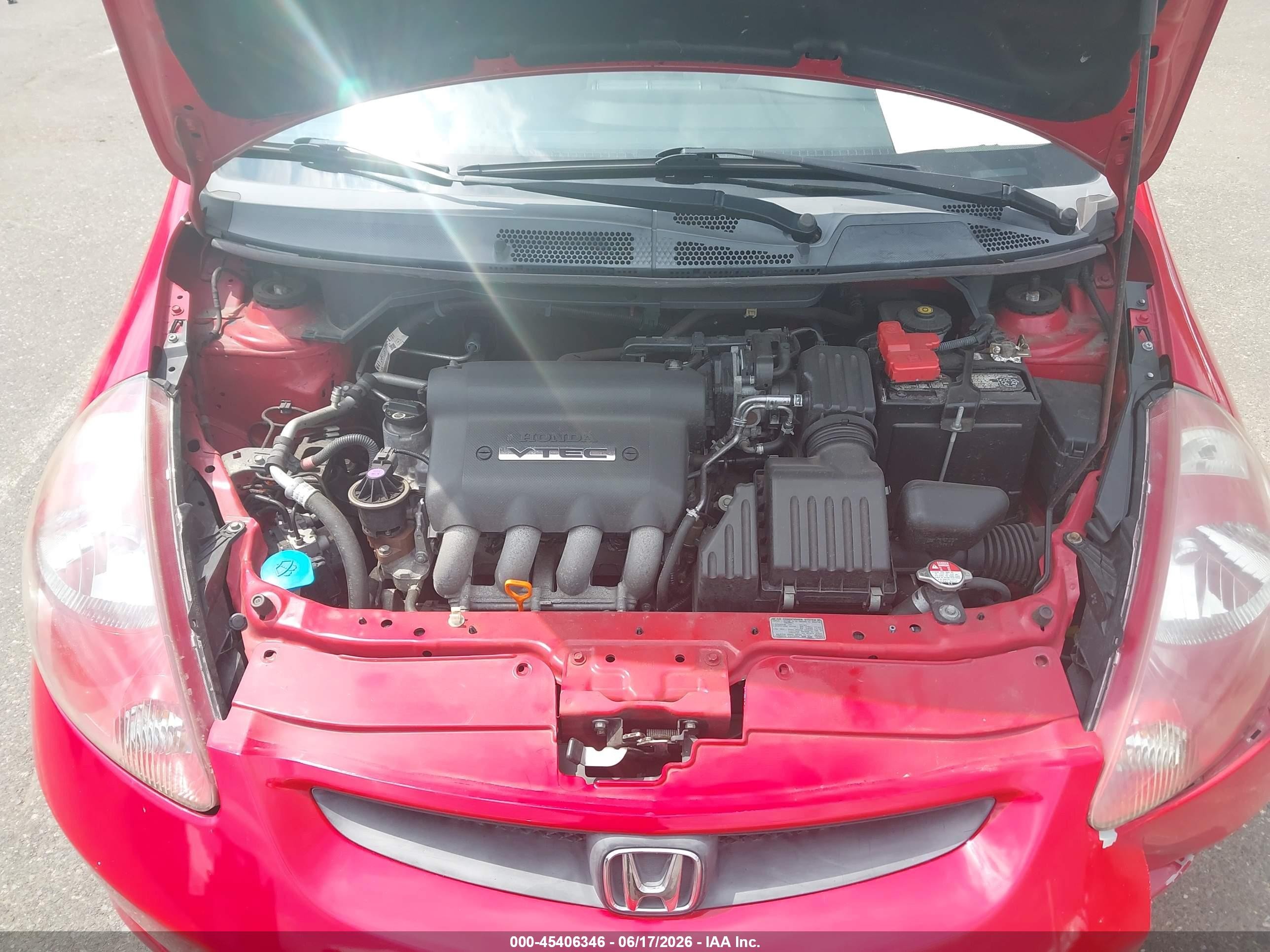 2007 Honda Fit   Red vin: JHMGD38427S055154