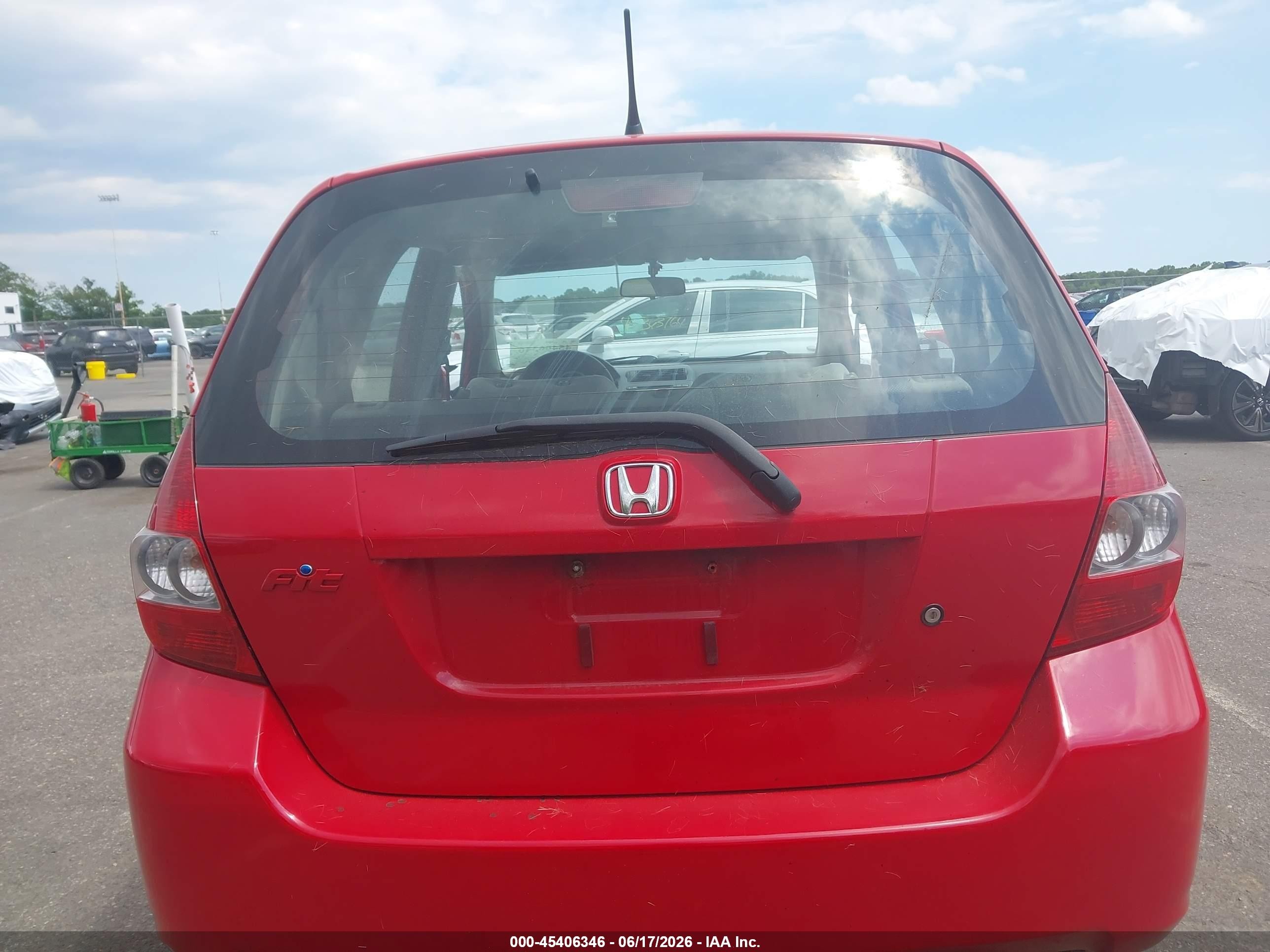 2007 Honda Fit   Red vin: JHMGD38427S055154