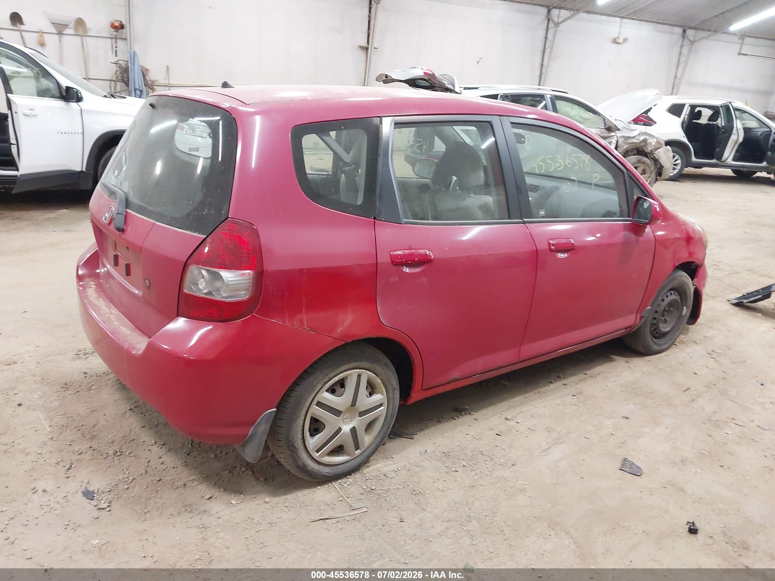 2007 Honda Fit   Red vin: JHMGD38437S021367