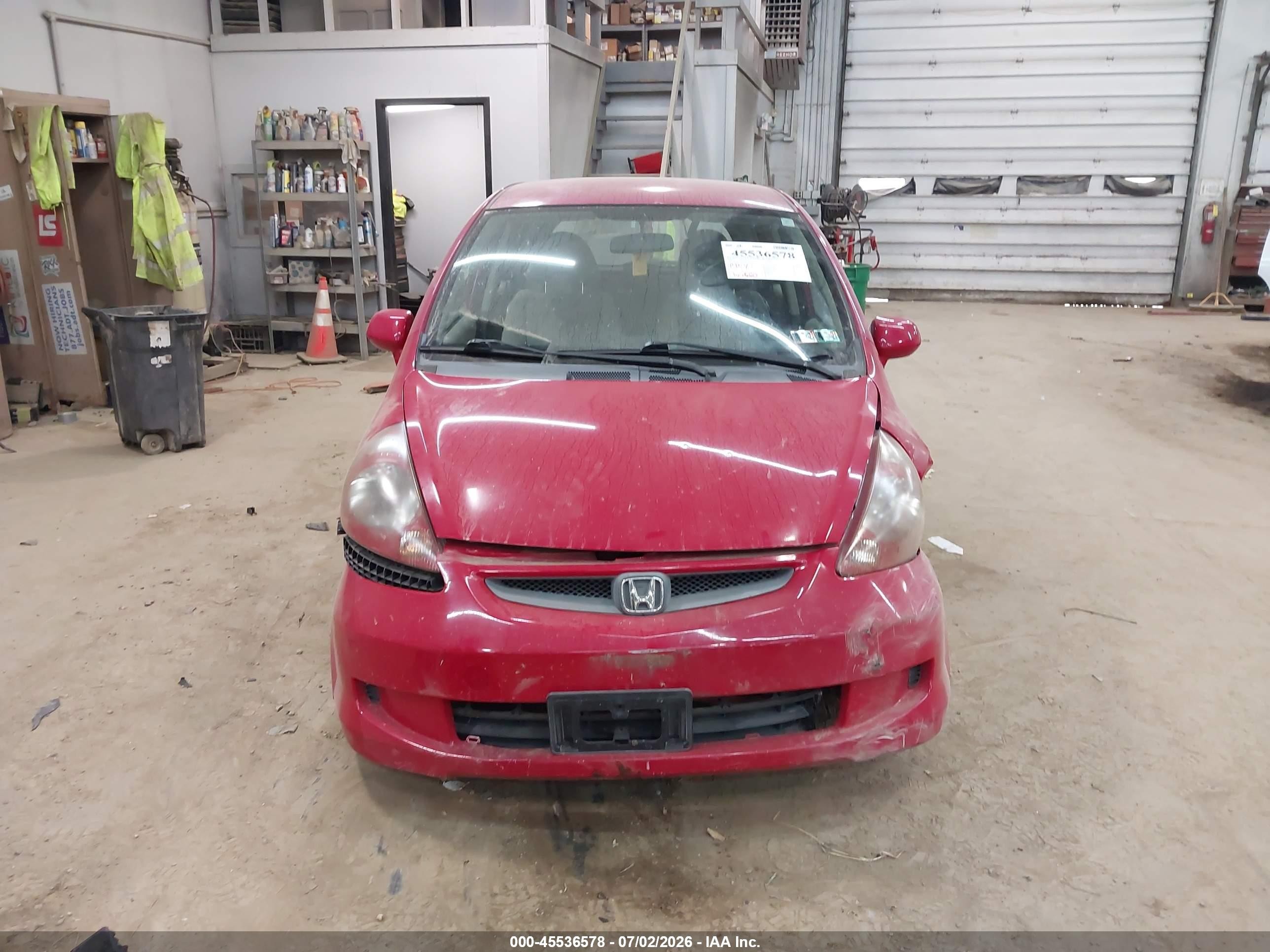 2007 Honda Fit   Red vin: JHMGD38437S021367