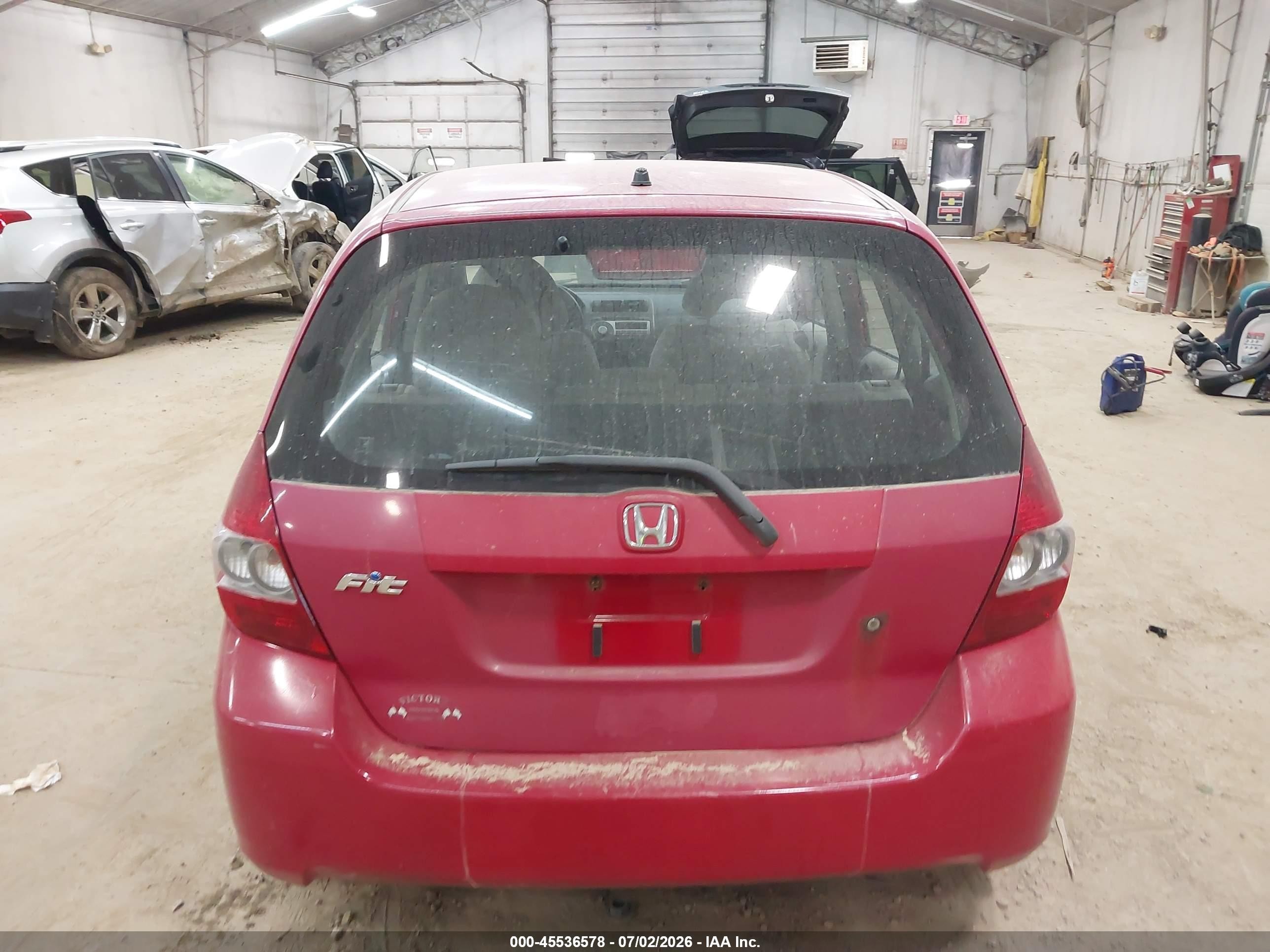 2007 Honda Fit   Red vin: JHMGD38437S021367