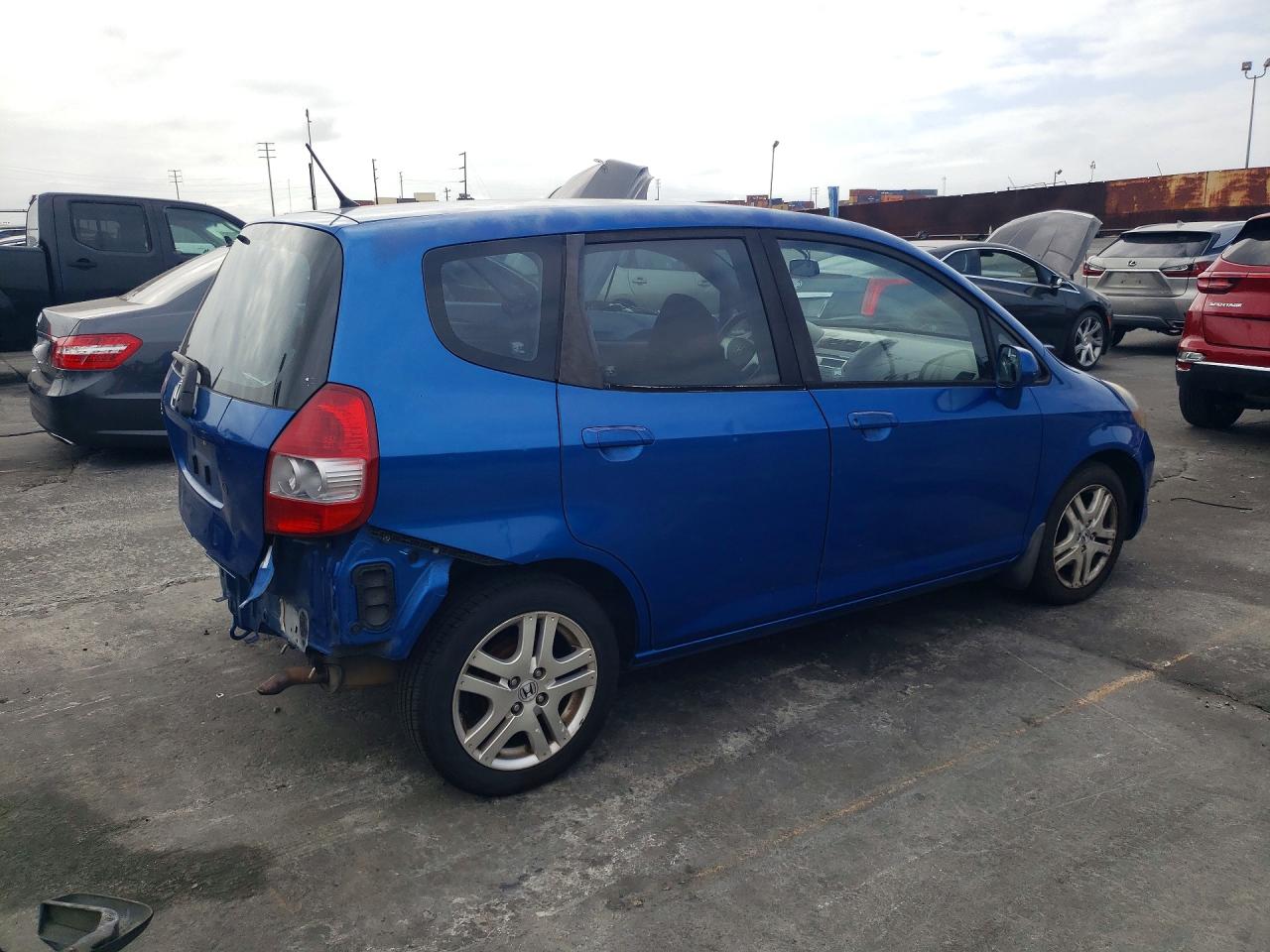 2007 Honda Fit Blue vin: JHMGD38437S049430