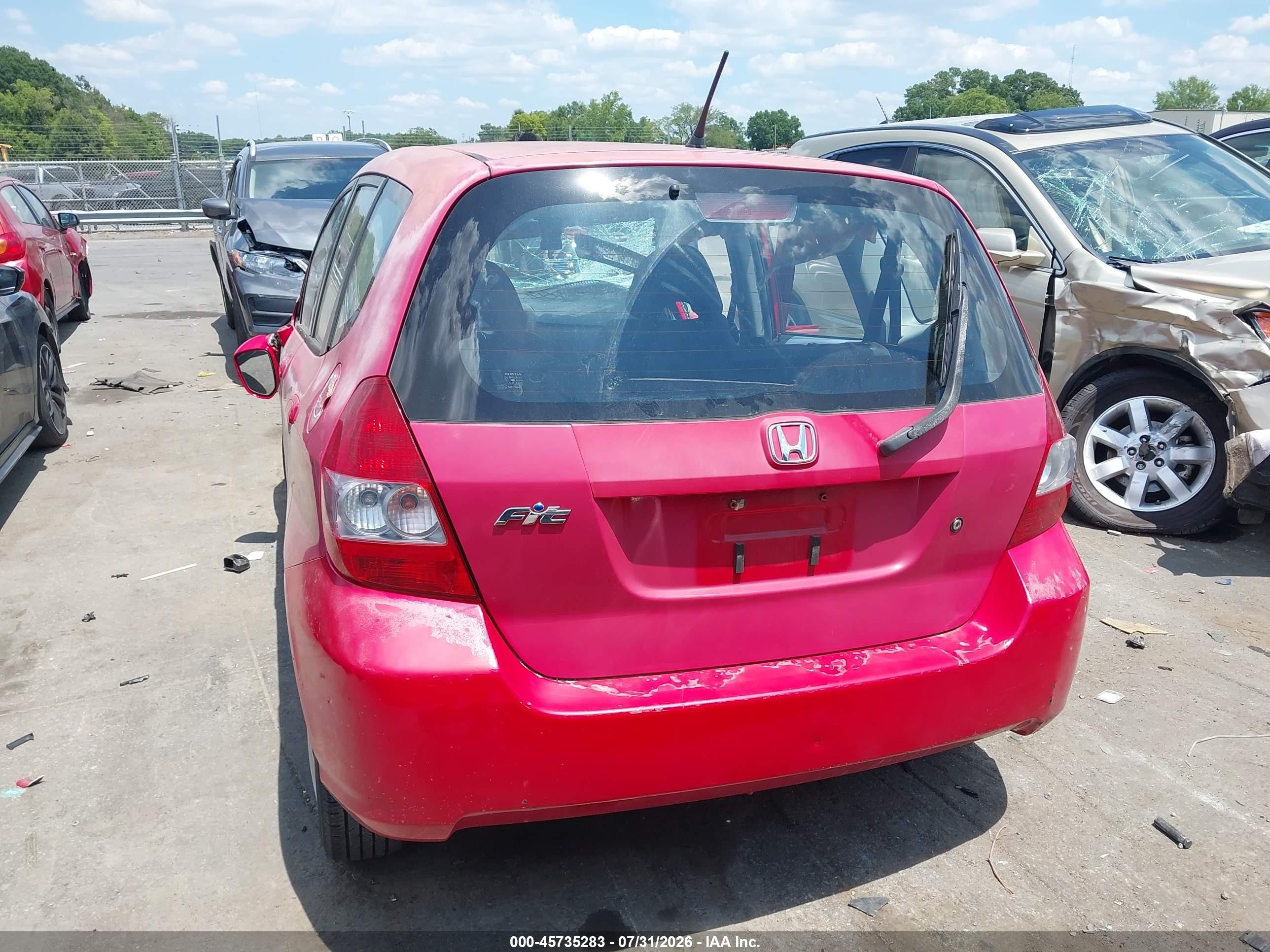 2008 Honda Fit   Red vin: JHMGD38438S000195