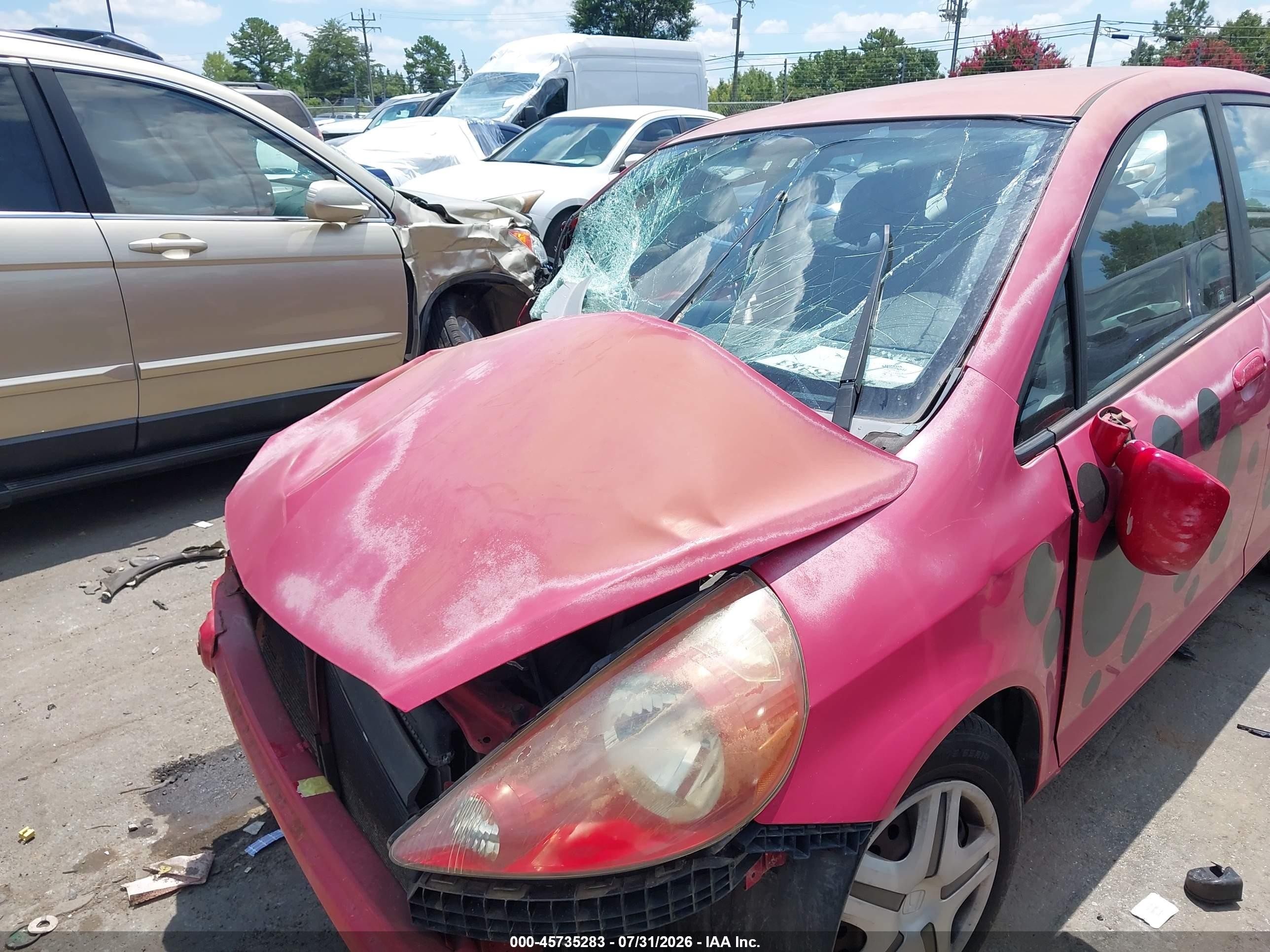 2008 Honda Fit   Red vin: JHMGD38438S000195