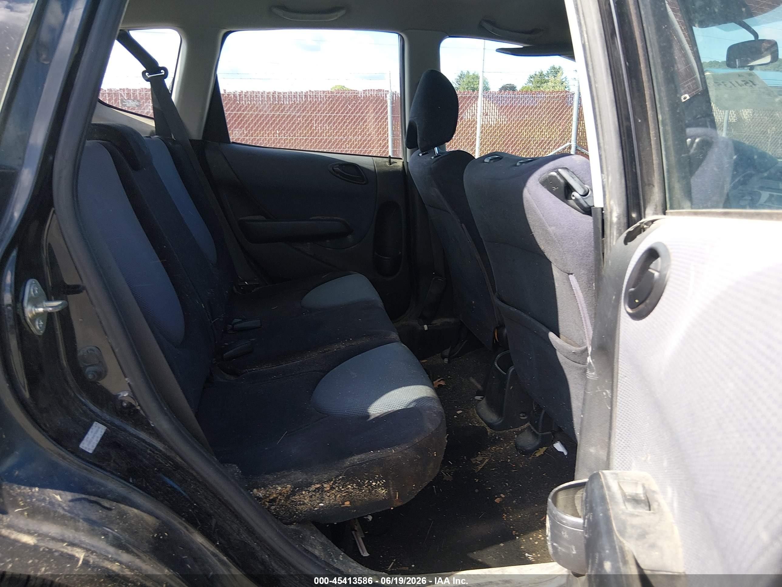 2007 Honda Fit   Black vin: JHMGD38457S066049
