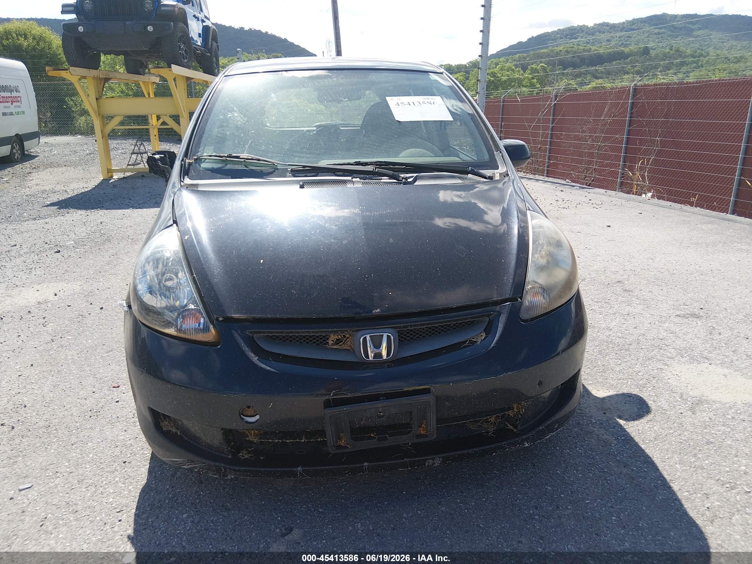 2007 Honda Fit   Black vin: JHMGD38457S066049