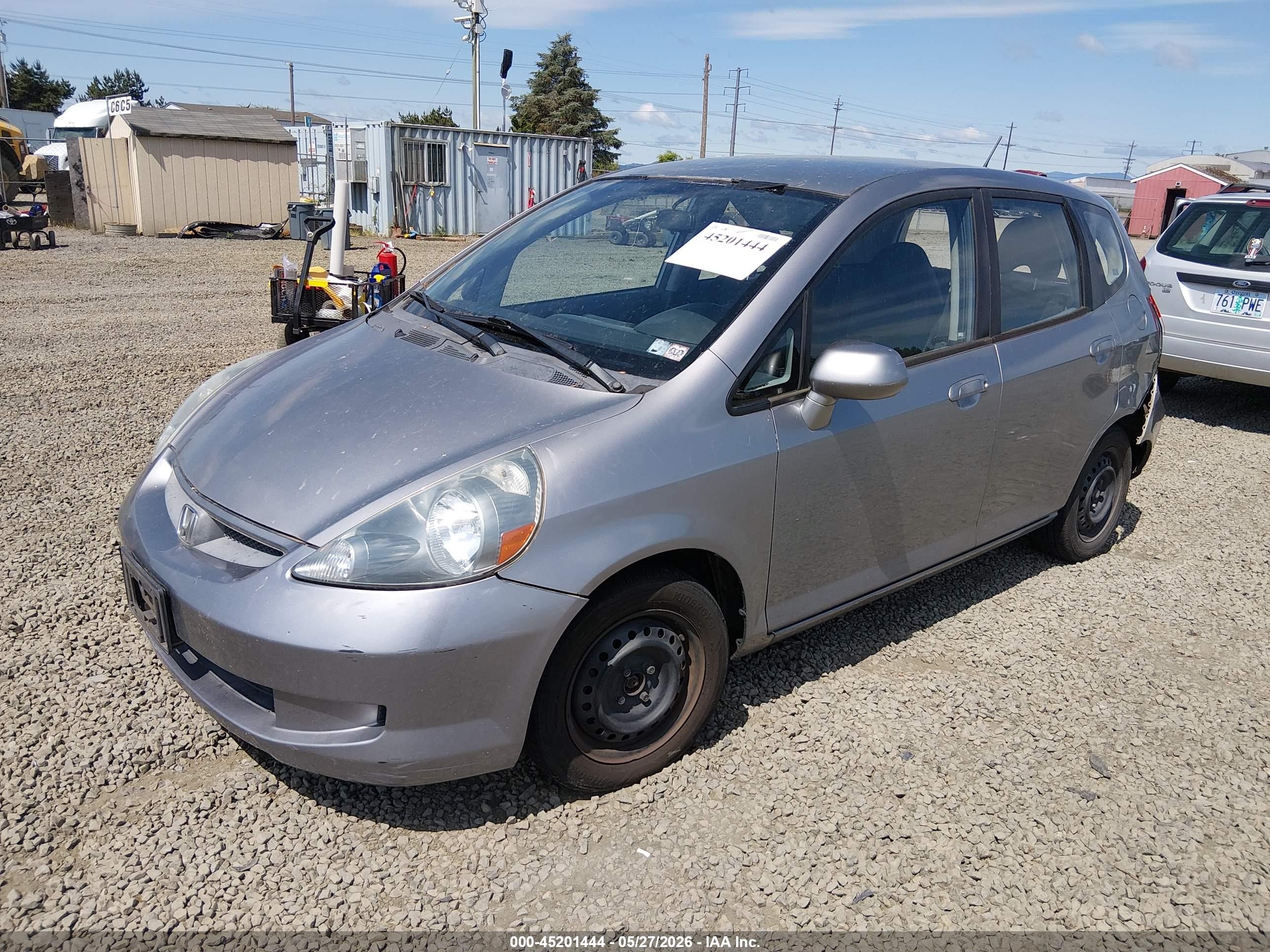 2007 Honda Fit   Silver vin: JHMGD38467S014235