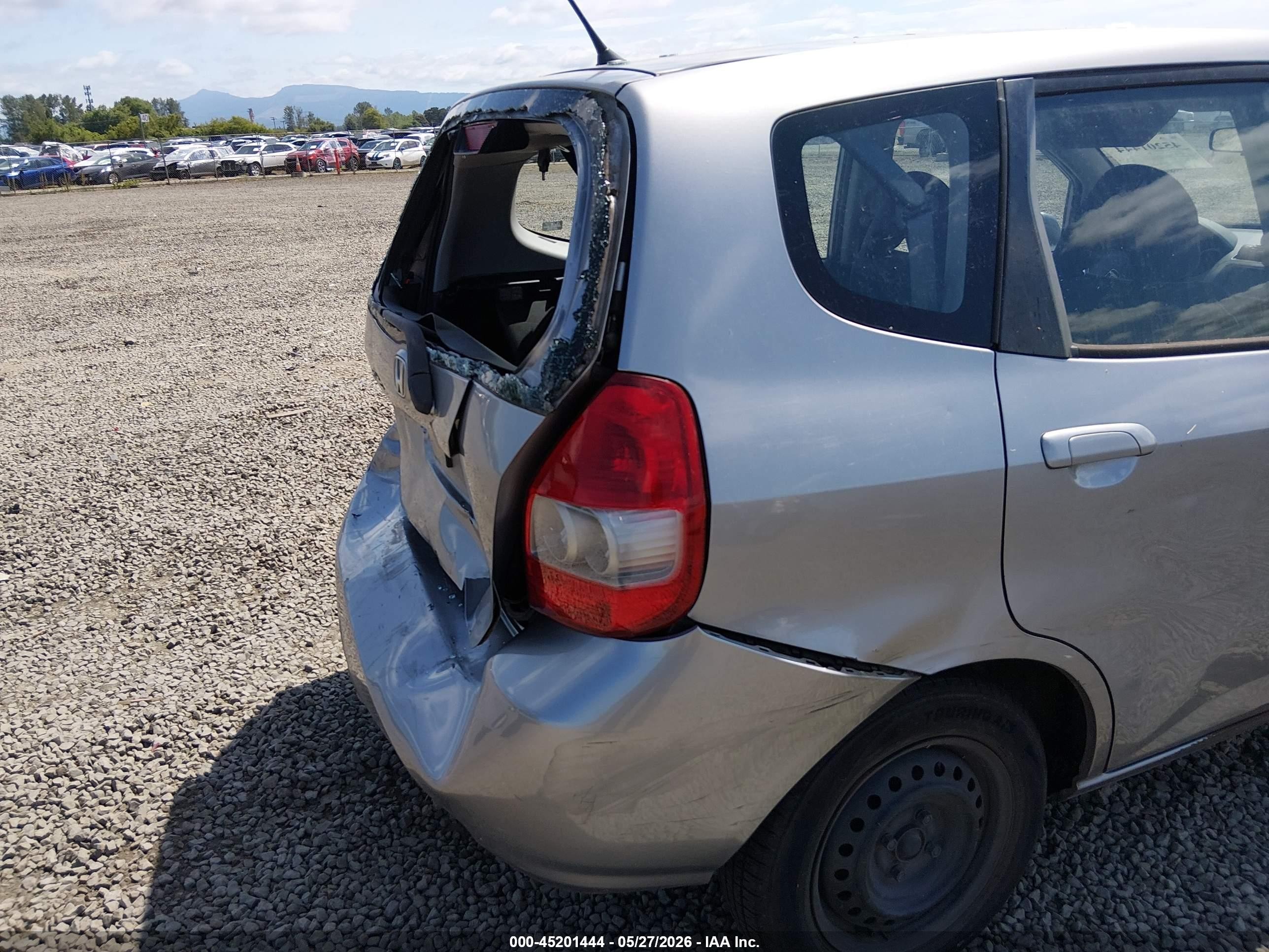 2007 Honda Fit   Silver vin: JHMGD38467S014235