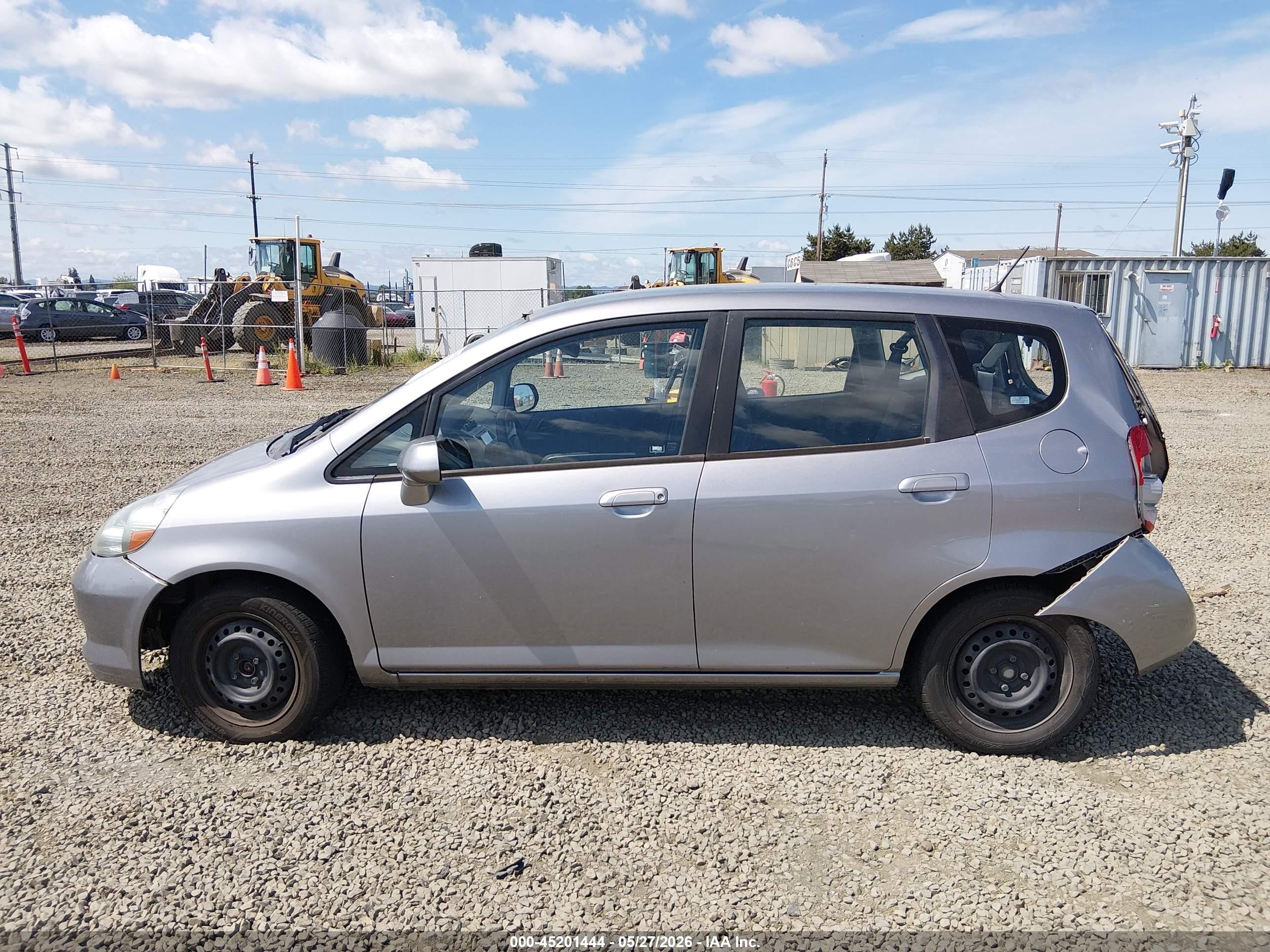 2007 Honda Fit   Silver vin: JHMGD38467S014235