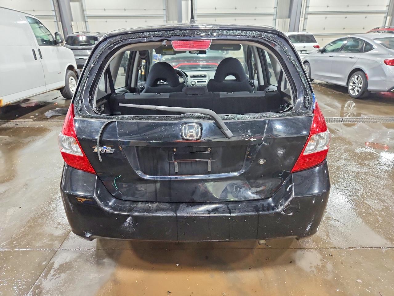 2008 Honda Fit Black vin: JHMGD38478S071884