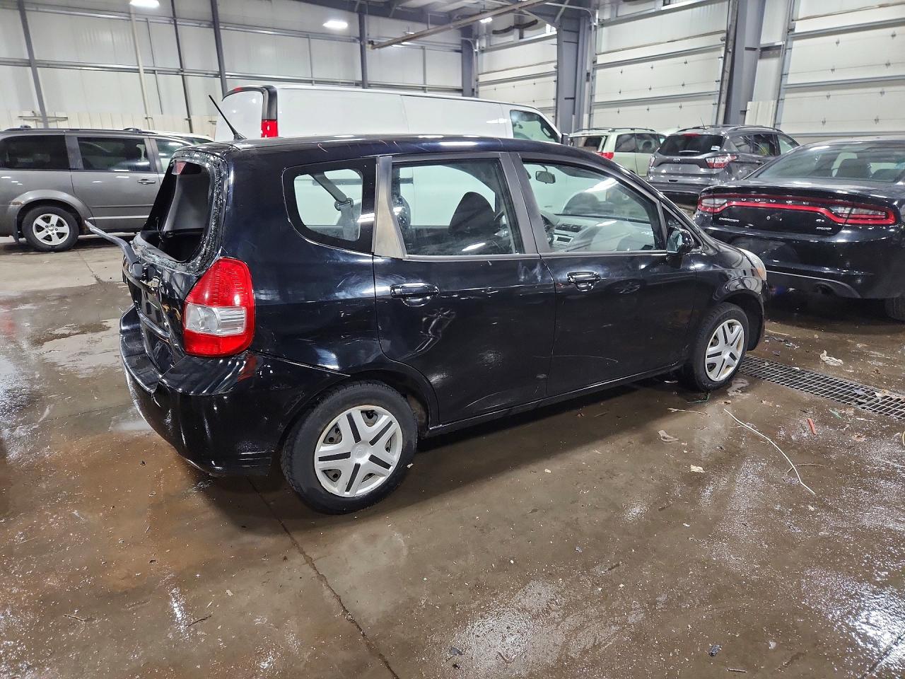 2008 Honda Fit Black vin: JHMGD38478S071884