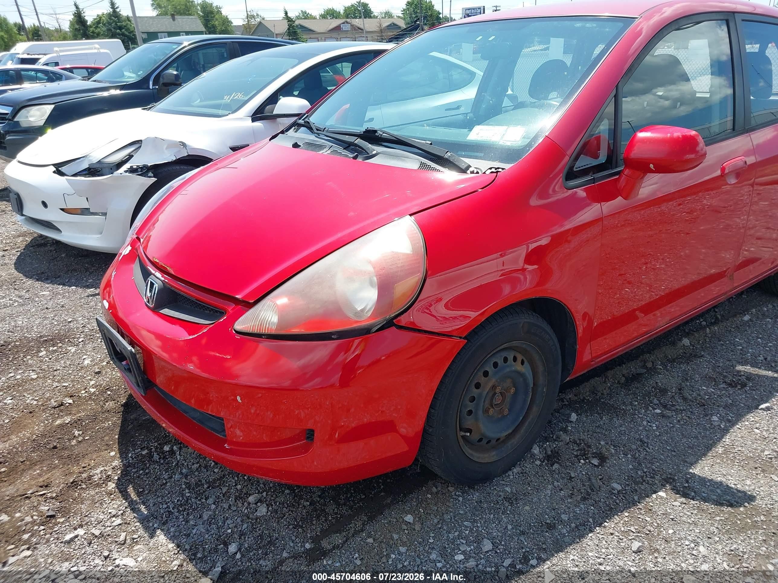 2008 Honda Fit   Red vin: JHMGD38498S067030