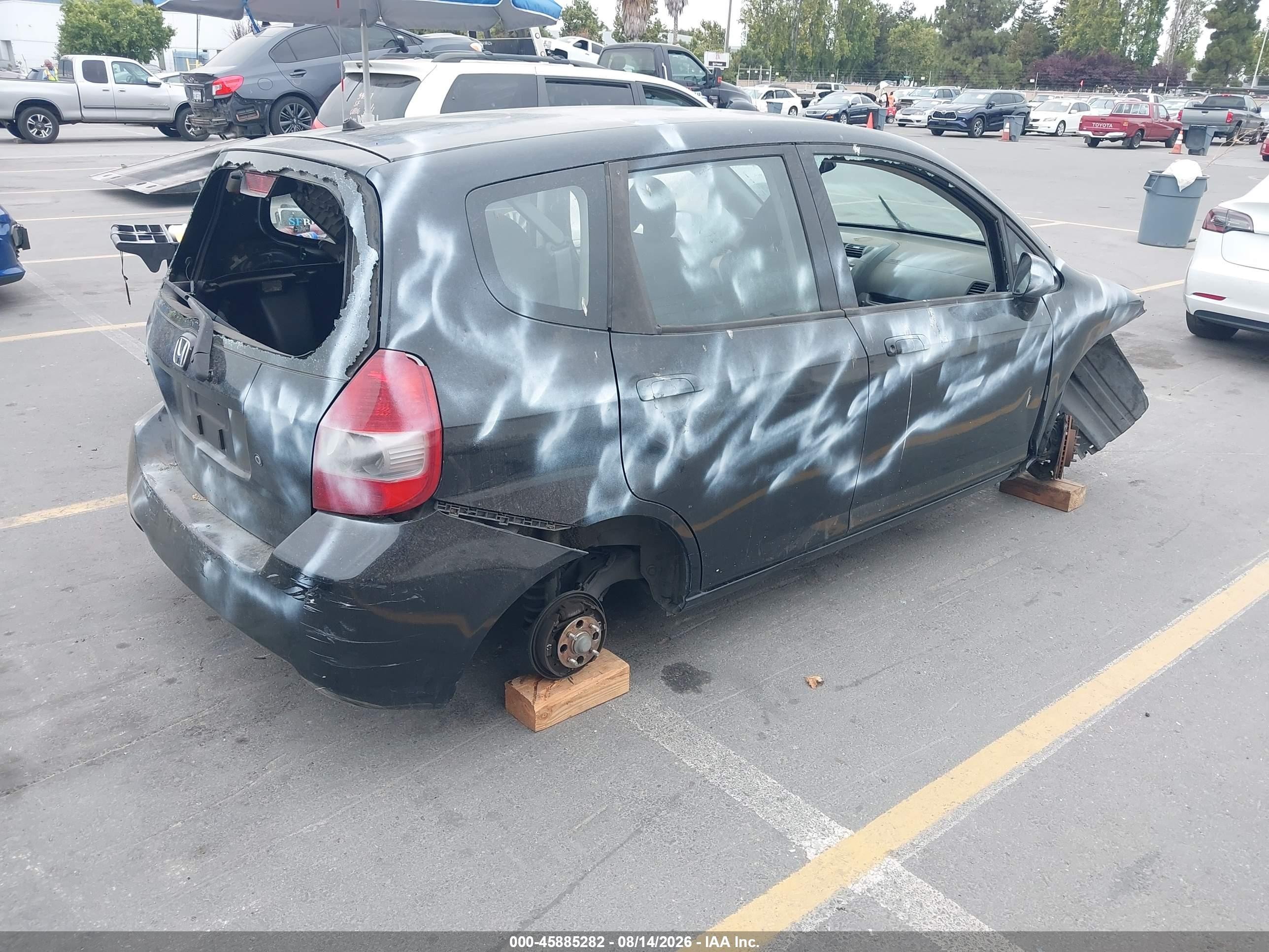 2007 Honda Fit   Black vin: JHMGD384X7S044144