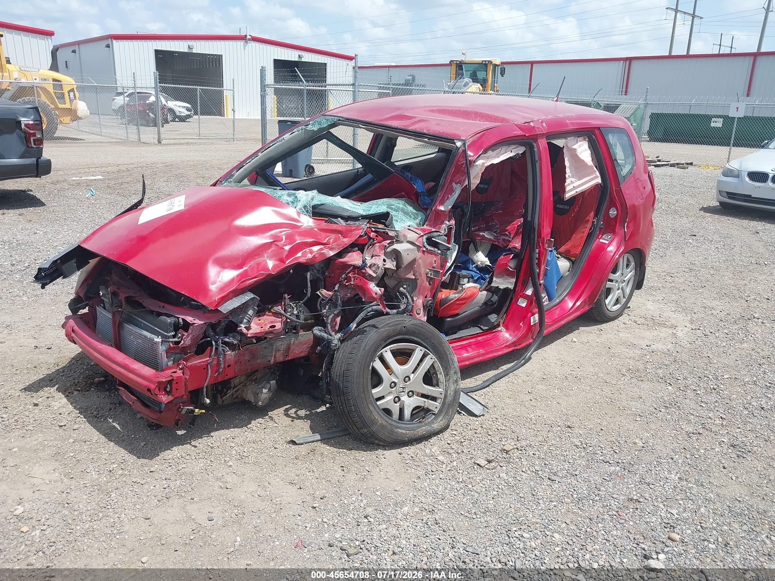 2007 Honda Fit   Red vin: JHMGD384X7S052552