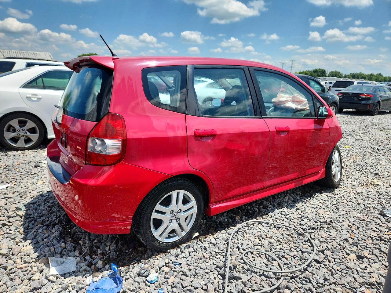 2007 Honda Fit S Red vin: JHMGD38607S002390
