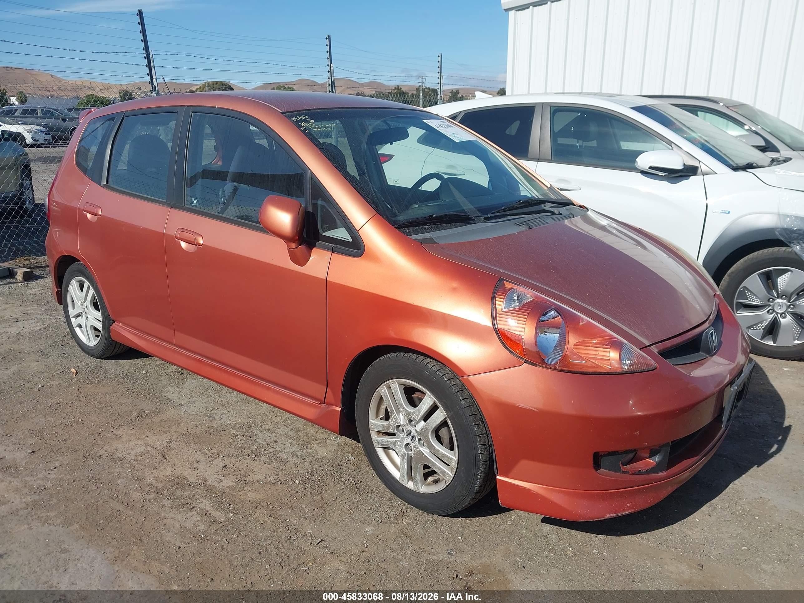 2007 Honda Fit Sport Orange vin: JHMGD38607S057101