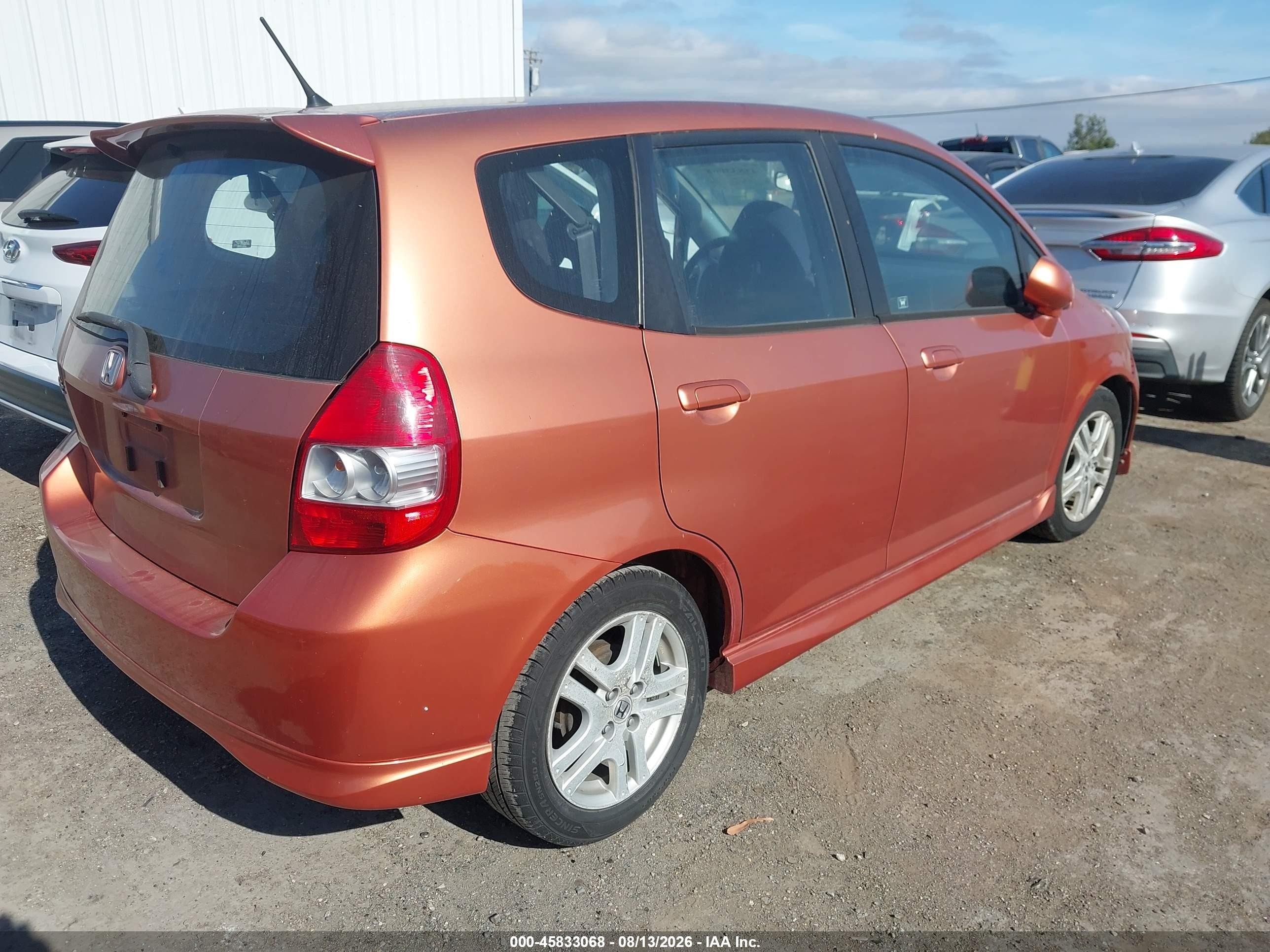 2007 Honda Fit Sport Orange vin: JHMGD38607S057101