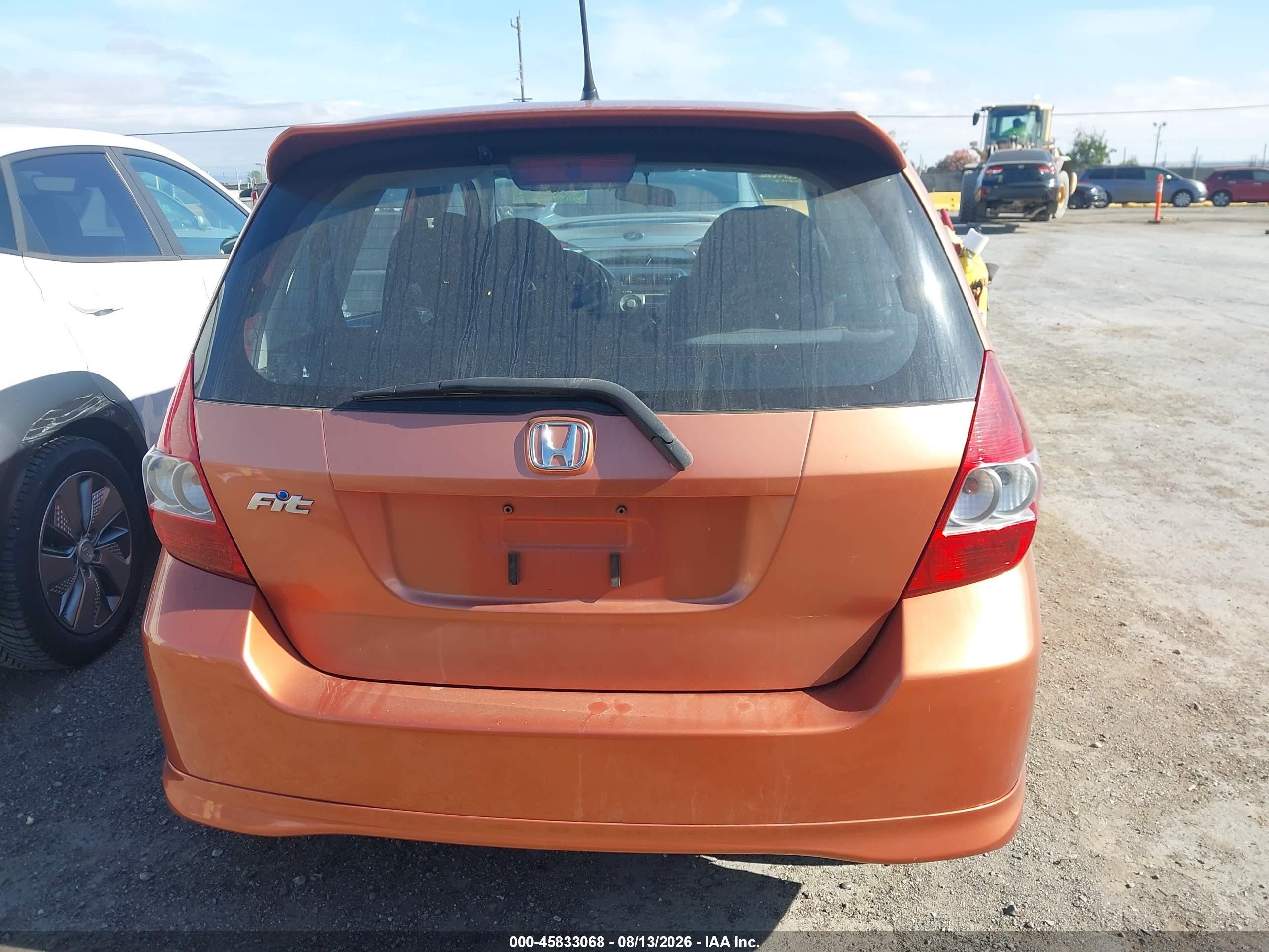 2007 Honda Fit Sport Orange vin: JHMGD38607S057101